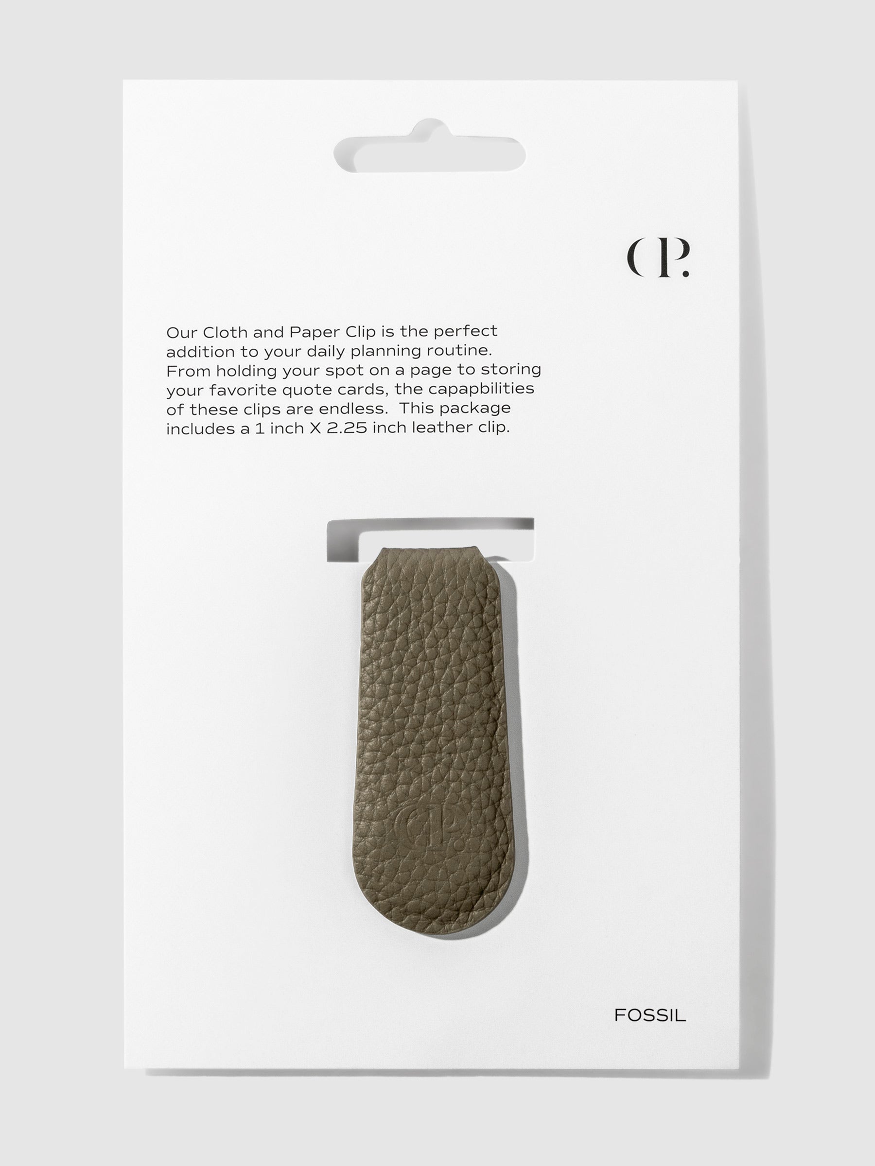 Cloth and Paperclip, Smooth Leather, Cloth and Paper. Clip in its packaging displayed on a neutral background. Color shown is fossil.