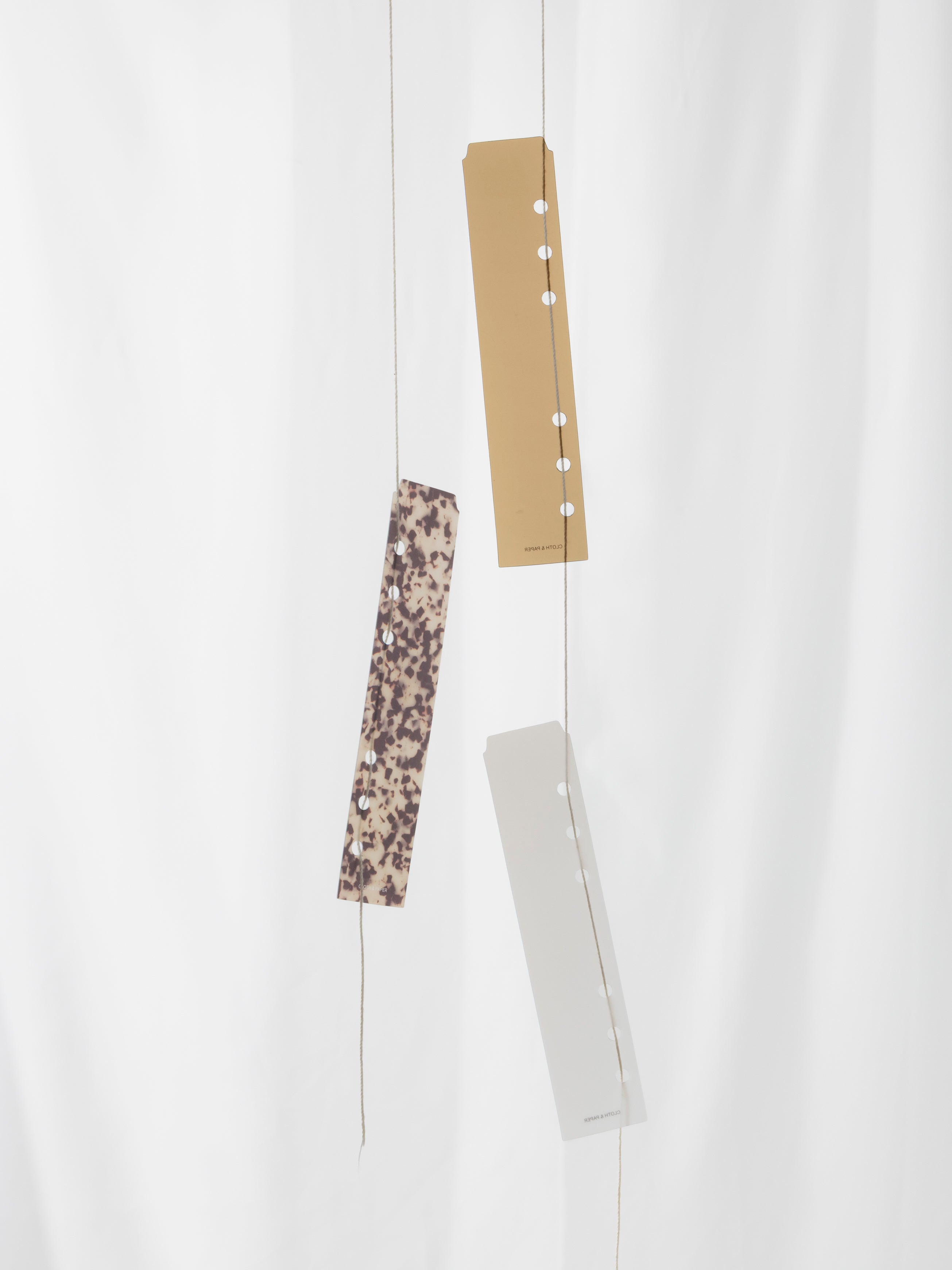 Tortoiseshell Narrow Page Marker in a discbound planner.