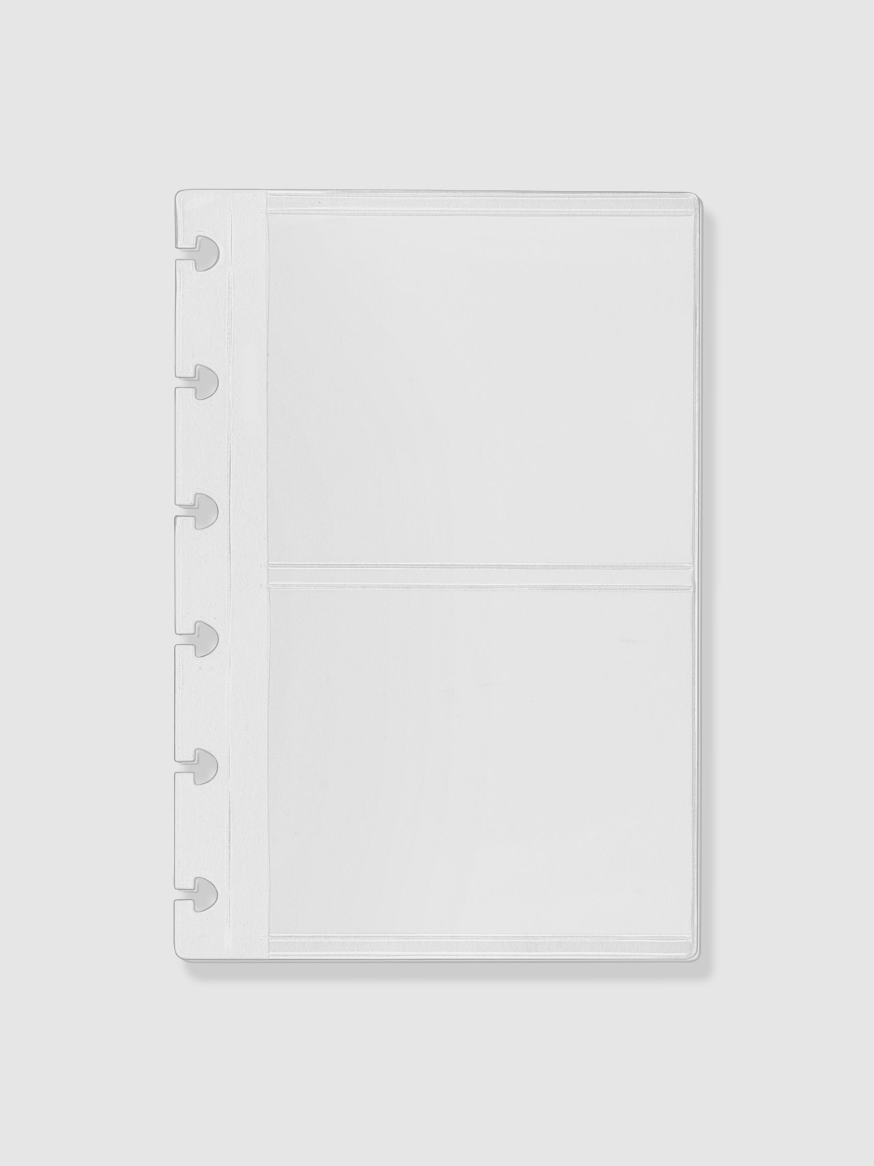 Card holder displayed on a neutral background. Size shown is CP Petite.