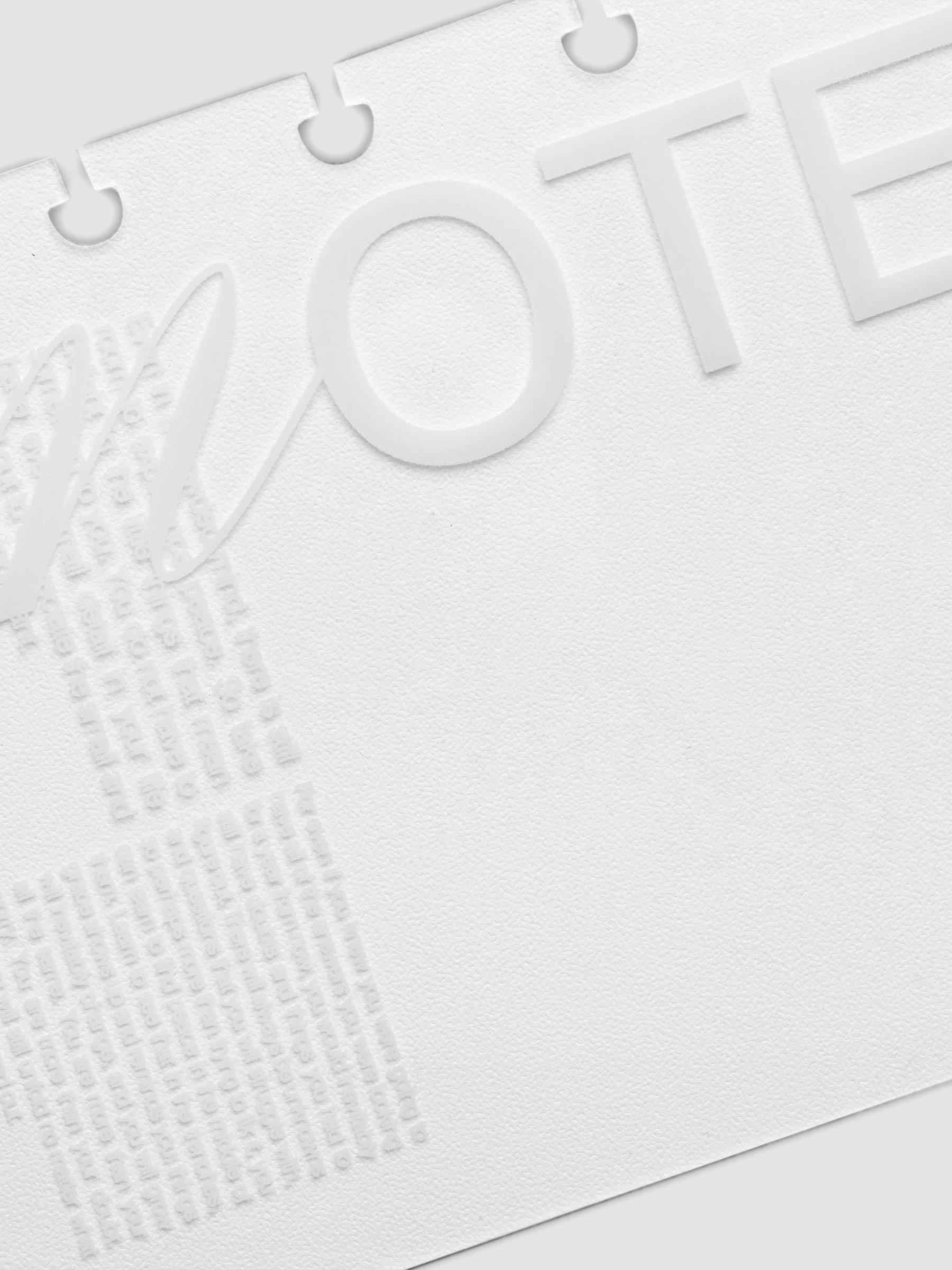 Close up on printing detail on the dashboard. Detail reads "notes".