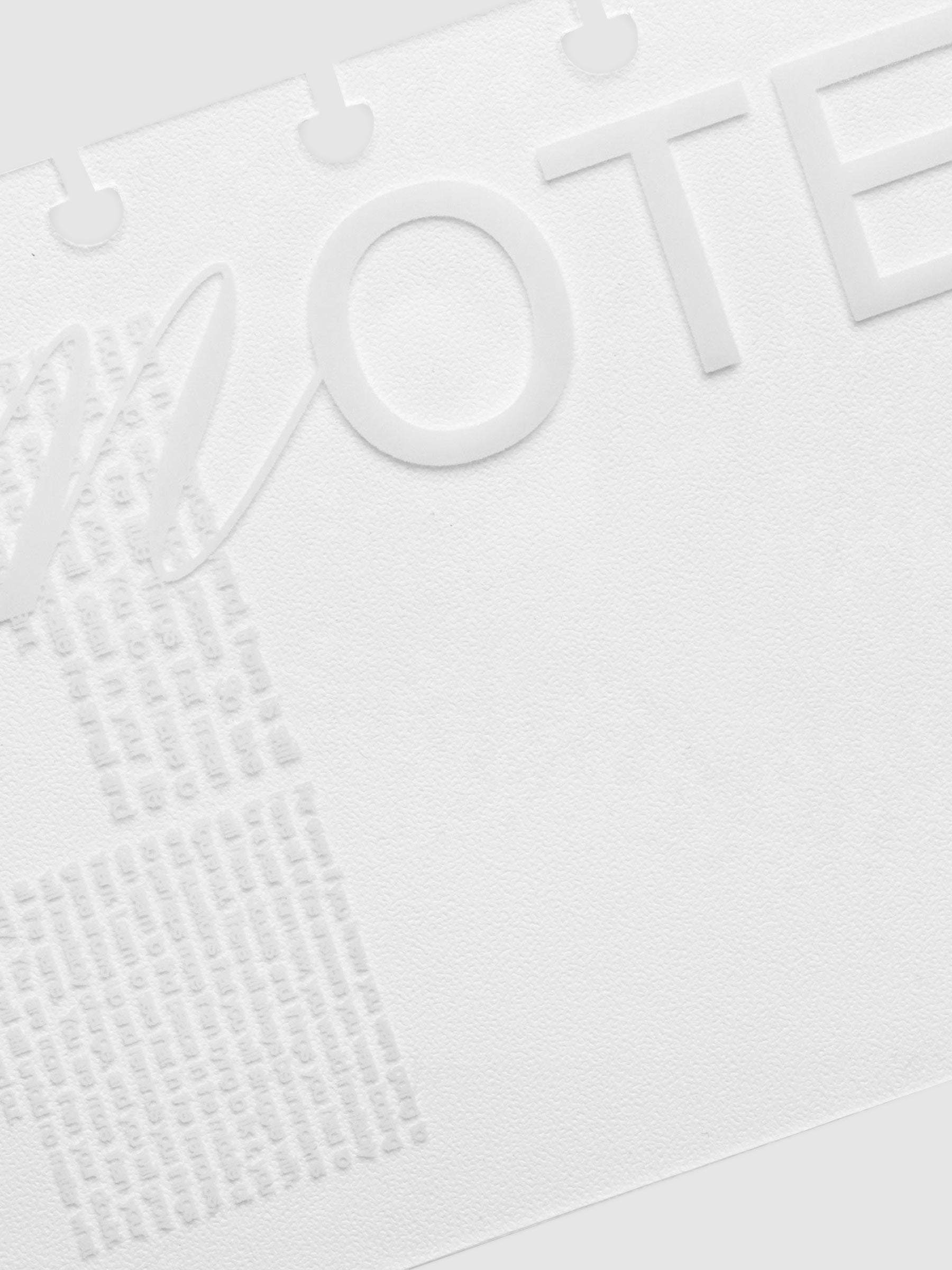 Close up on printing detail on the dashboard. Detail reads "notes".