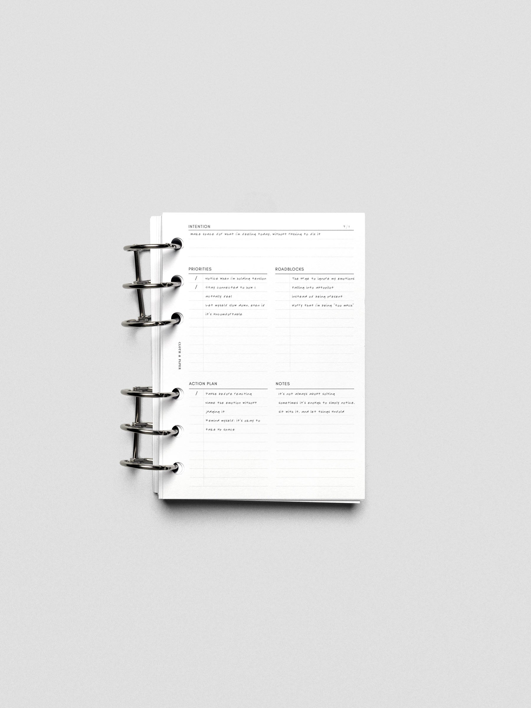 Daily Intention Planner Inserts show filled out in A6 size ring bound.