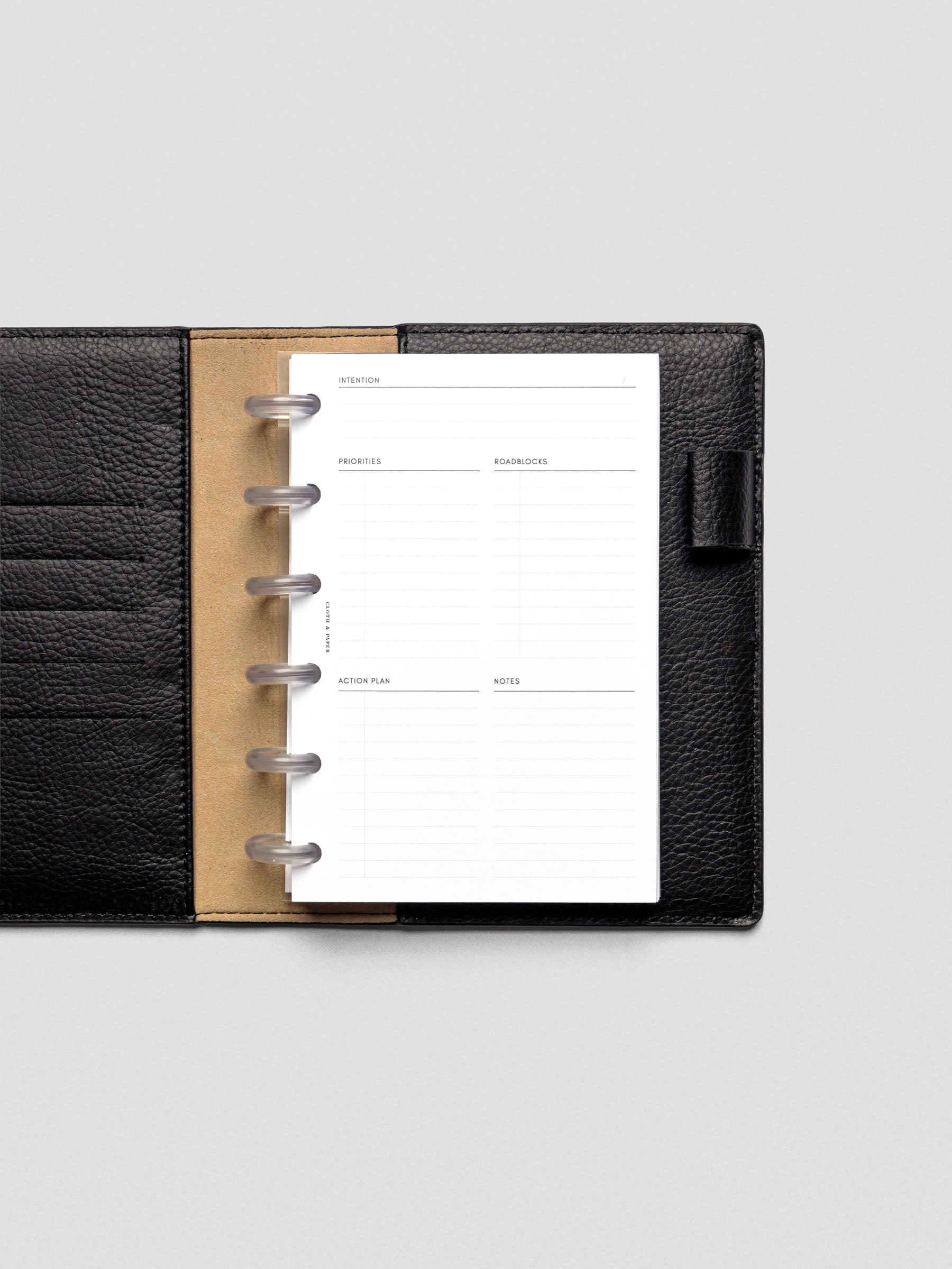 Daily Intention Planner Inserts show blank in CP Petite size disc bound in a leather folio.