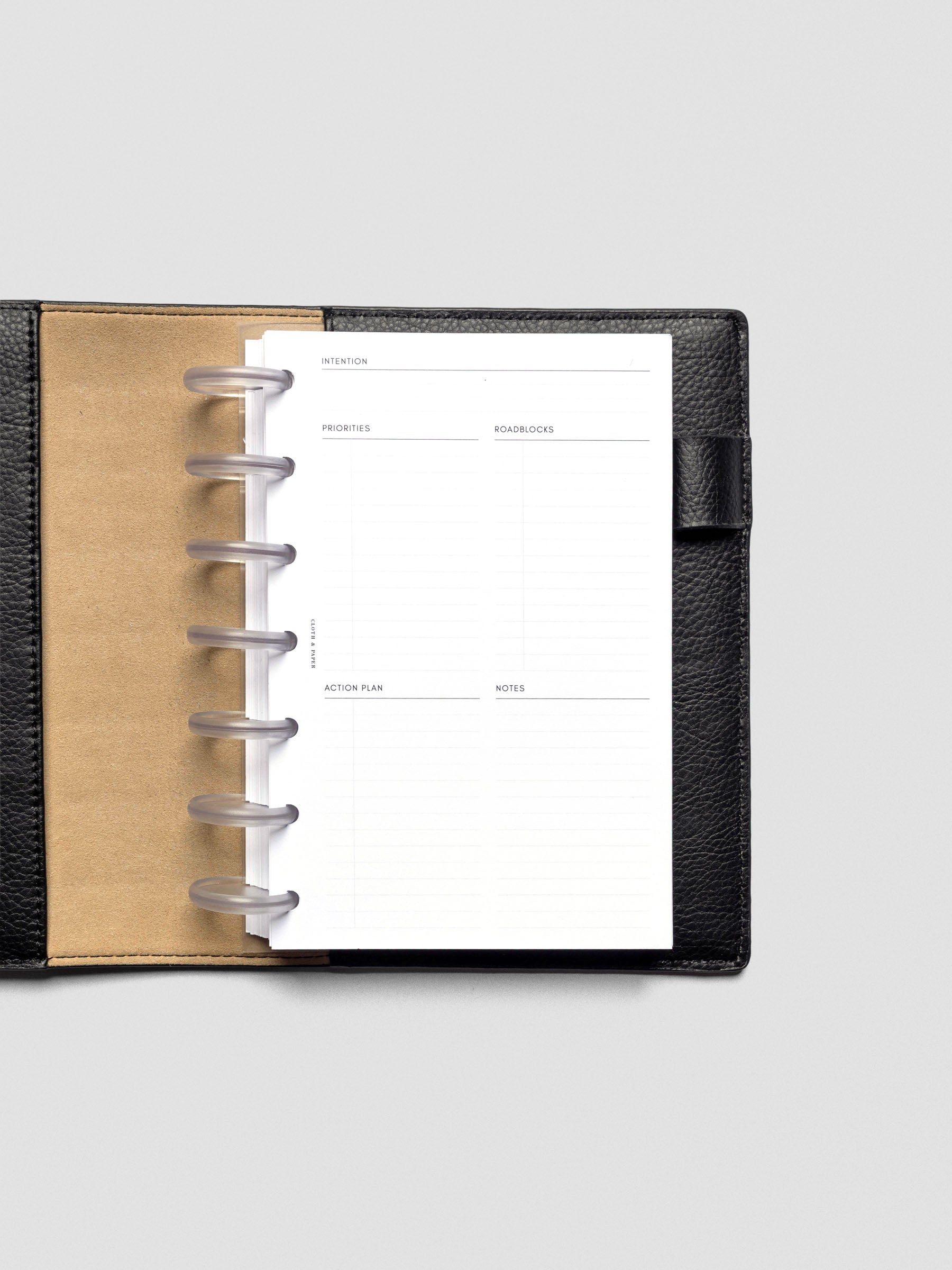 Daily Intention Planner Inserts show blank in HP Mini size disc bound in a leather cover.