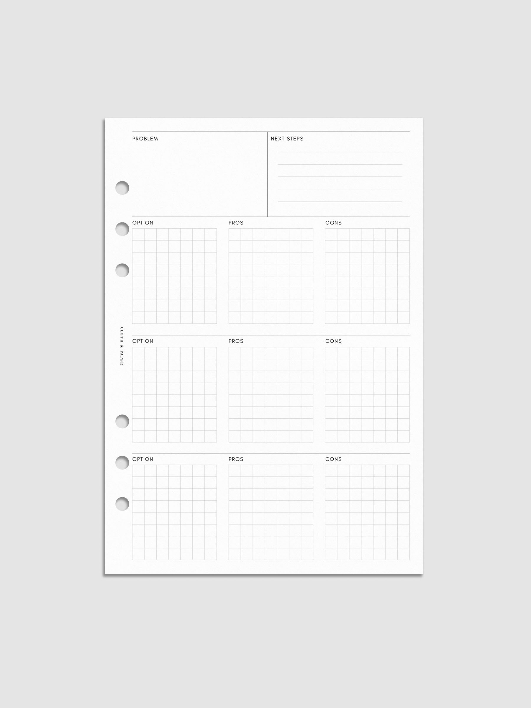 A5 decision-making insert with structured sections for problem, next steps, and gridded boxes labeled option, pros, and cons. Minimal white design with grey lines and six-ring punches on the side.