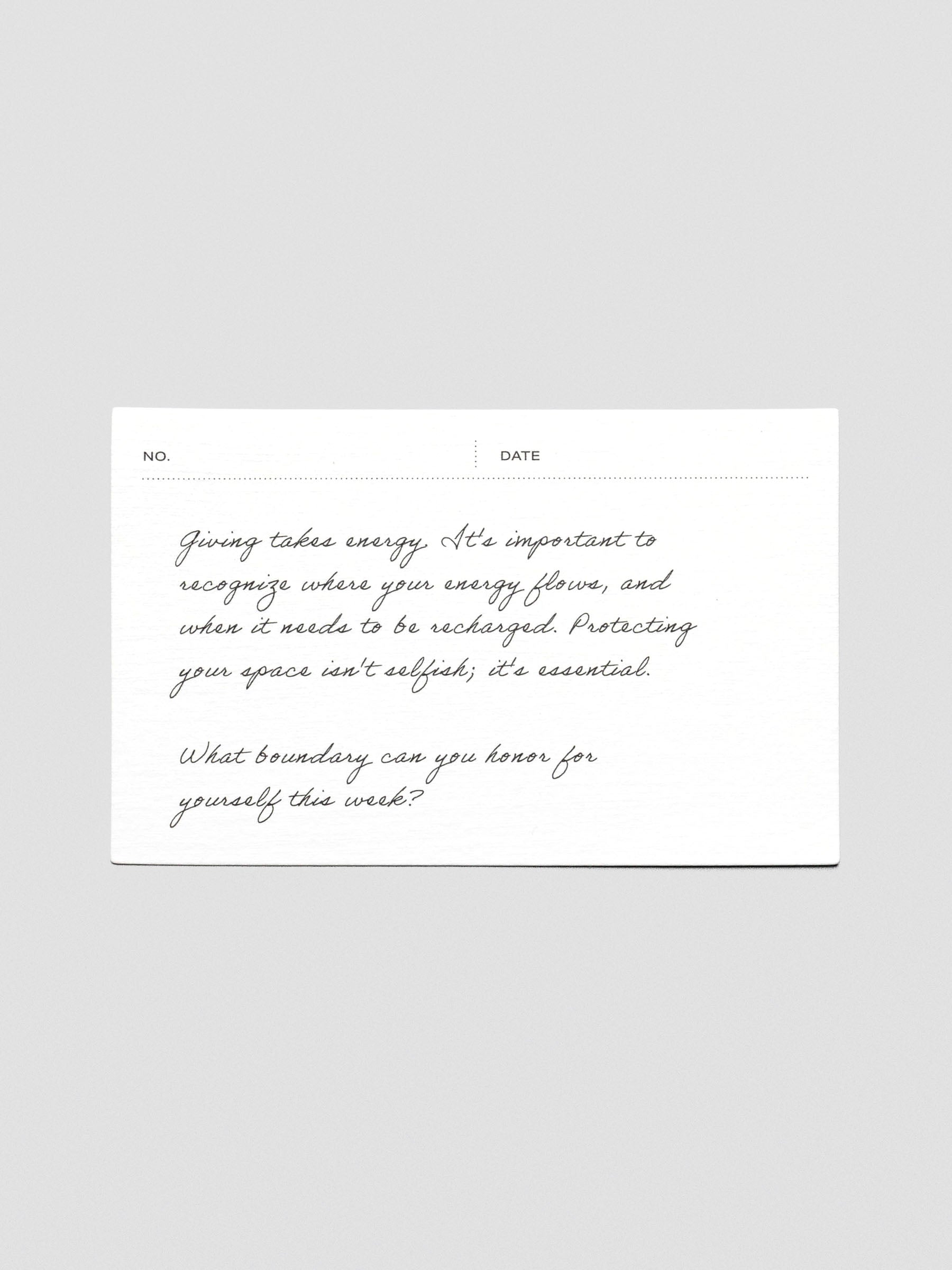 A white journaling card reading "Giving takes energy. It's important to recognize where your energy flows, and when it needs to be recharged. Protecting your space isn't selfish; it's essential. What boundary can you honor for yourself this week?".