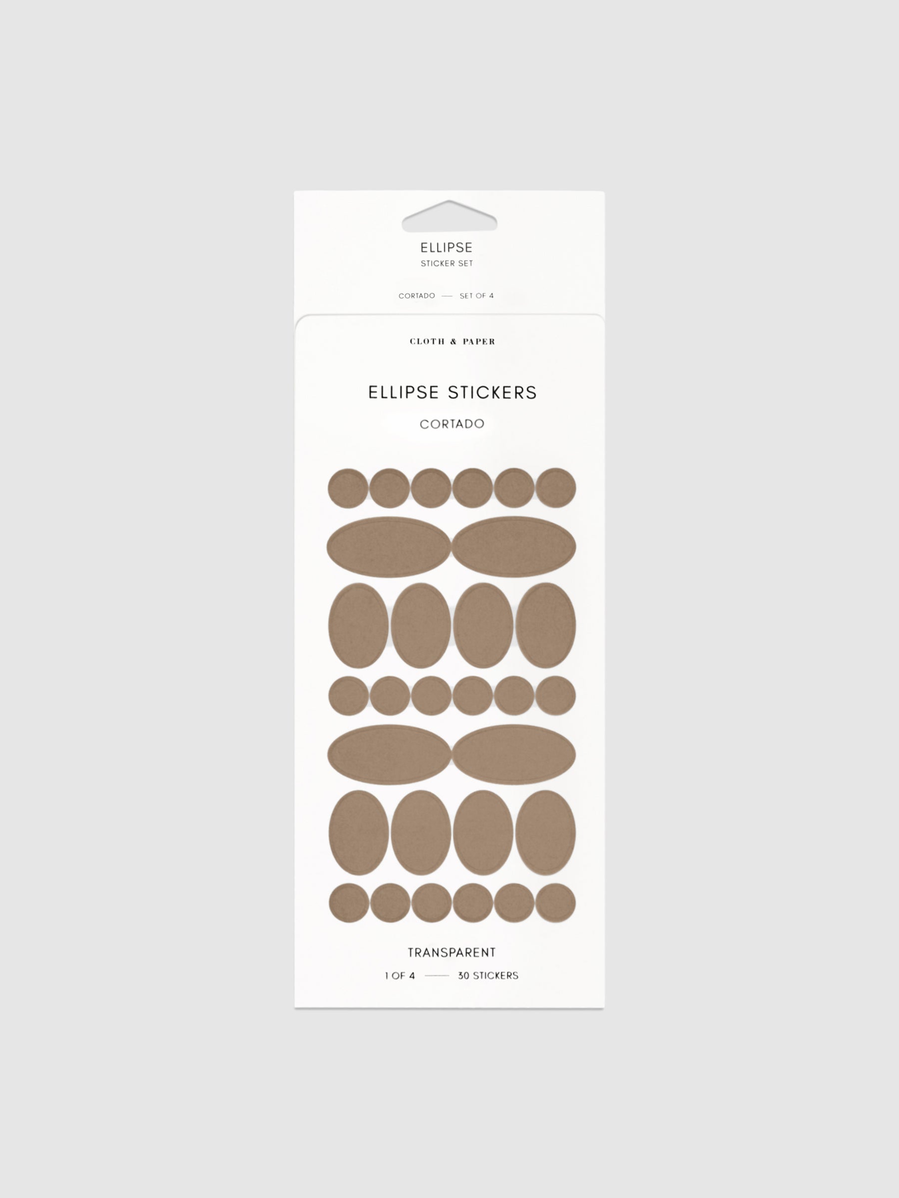 Cortado stickers in their packaging on a neutral background.