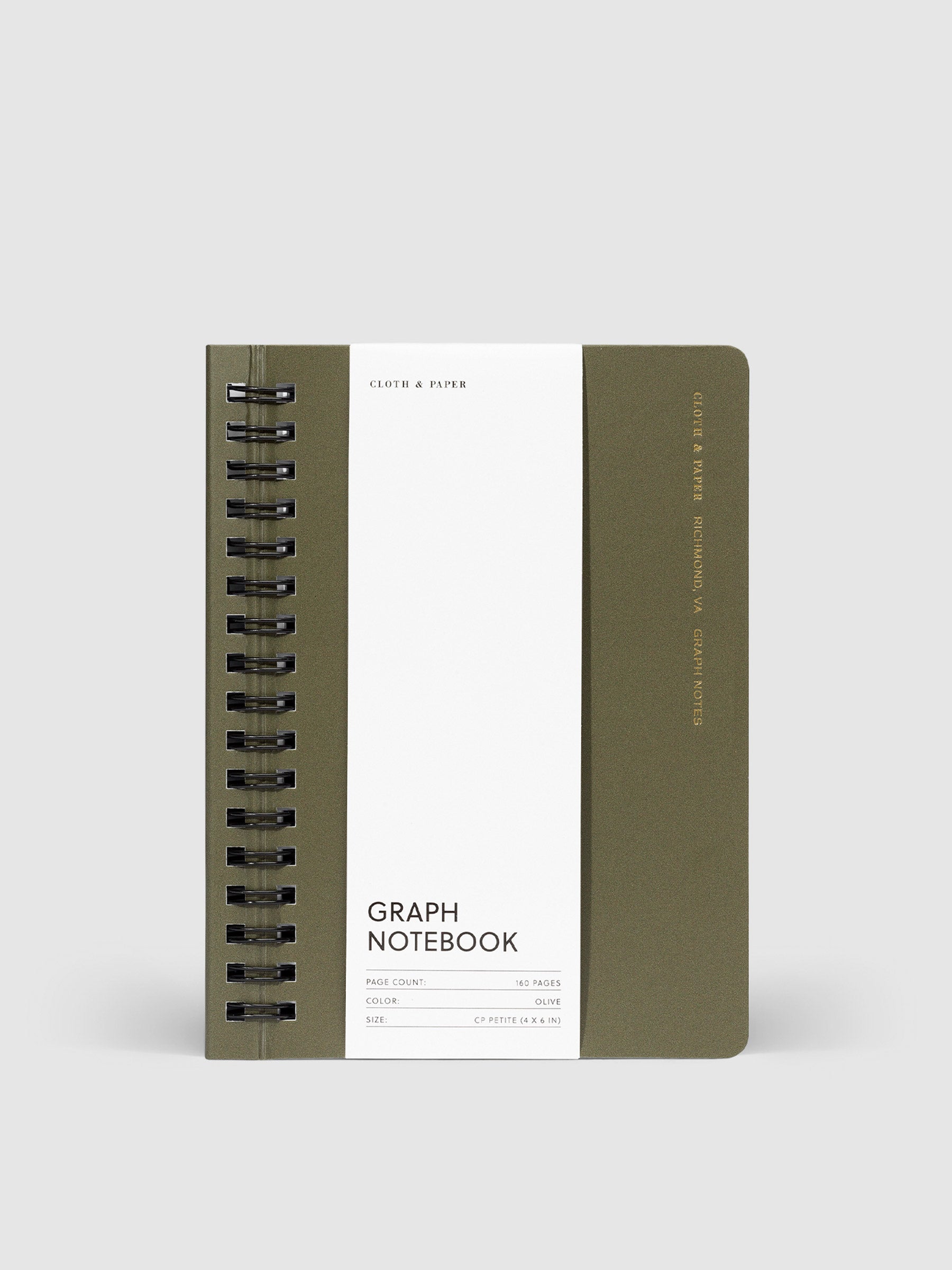 Olive notebook in its packaging displayed on a neutral background.