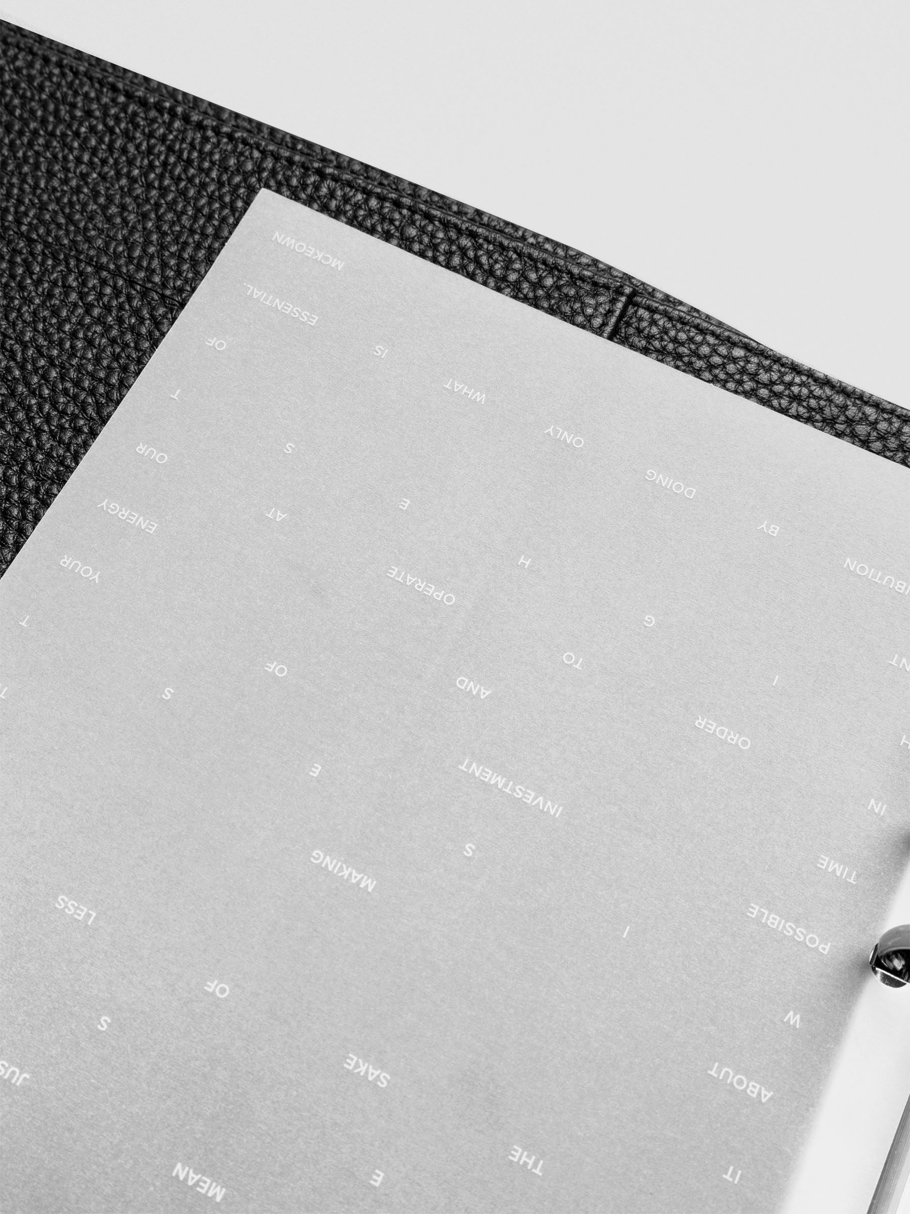 Close up of transparent dashboard layer with white printed text design.