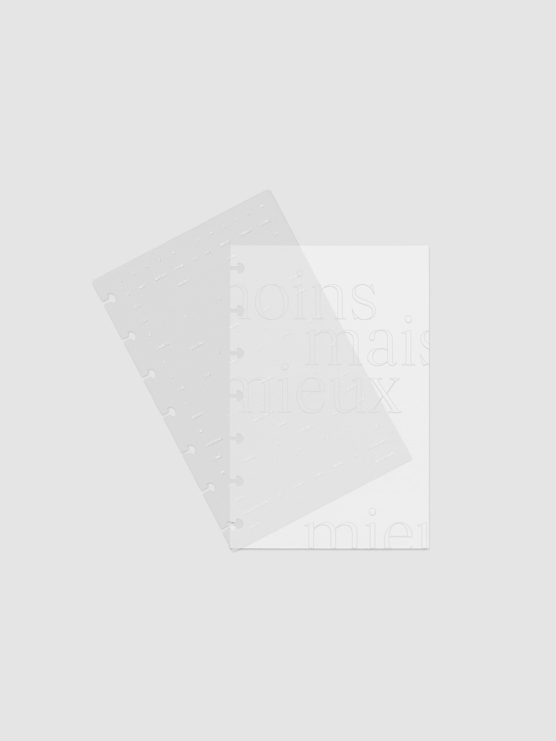 Essentialism Dashboard Duo reading "moins mai mieux" in size HP Mini; shown with layers offset.