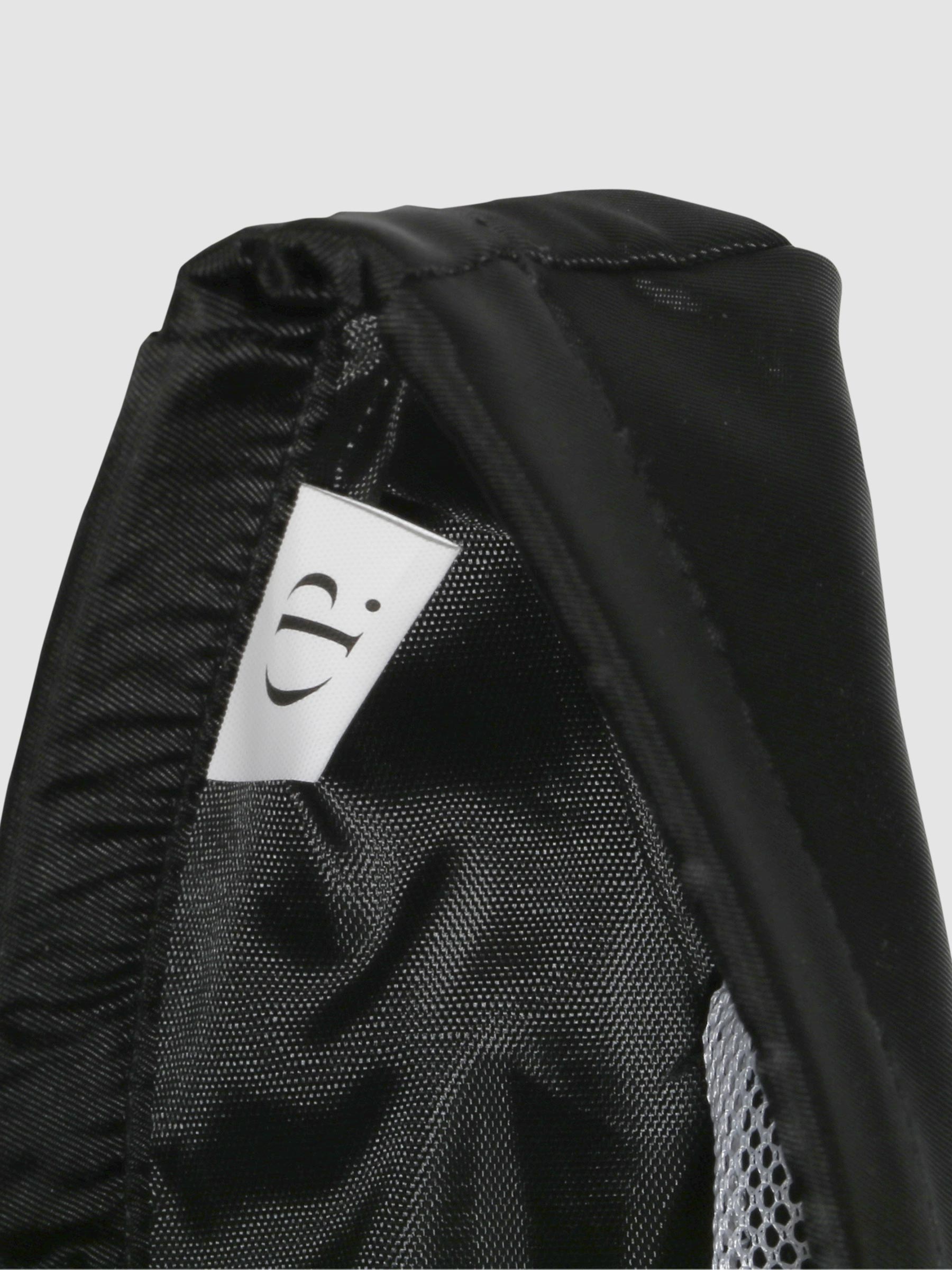 Closeup of Cloth and Paper tag inside a Black liner.