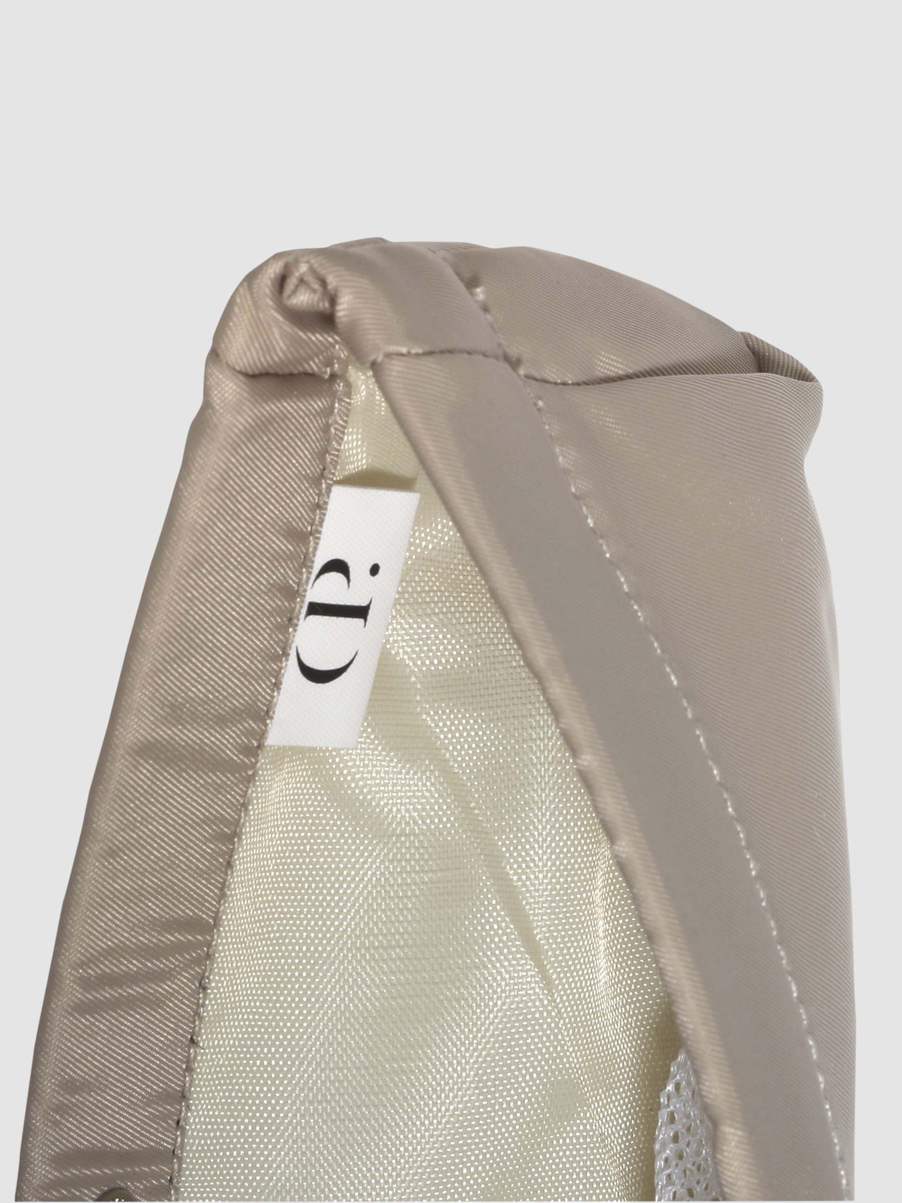 Closeup of Cloth and Paper logo inside Cream liner.