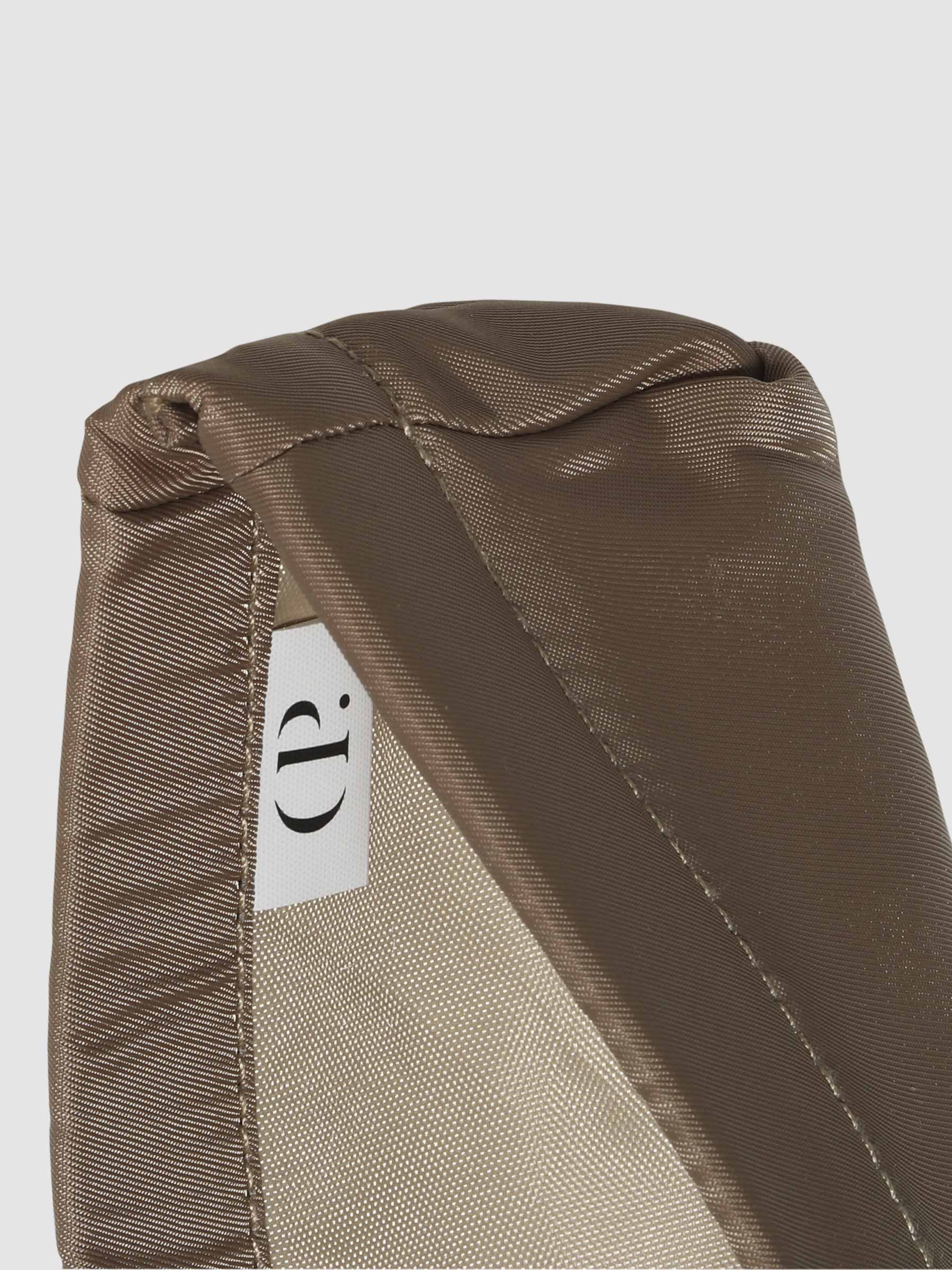 Closeup of Cloth and Paper logo inside Fossil liner.