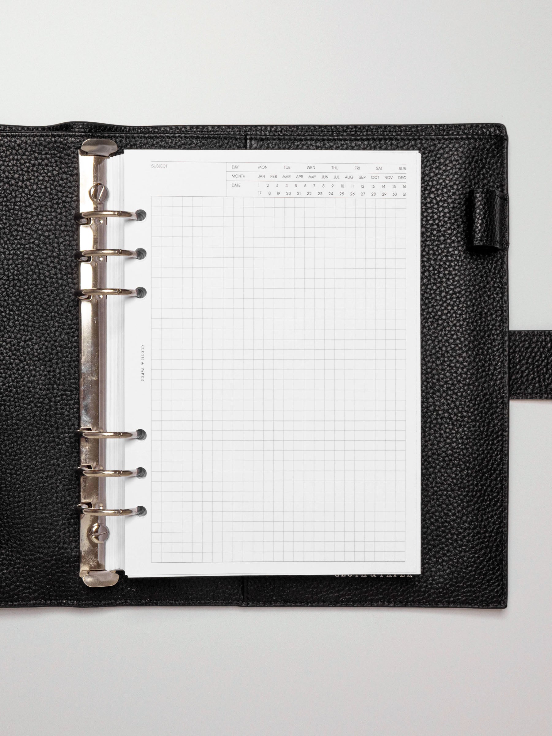 Insert in use inside a black leather planner.