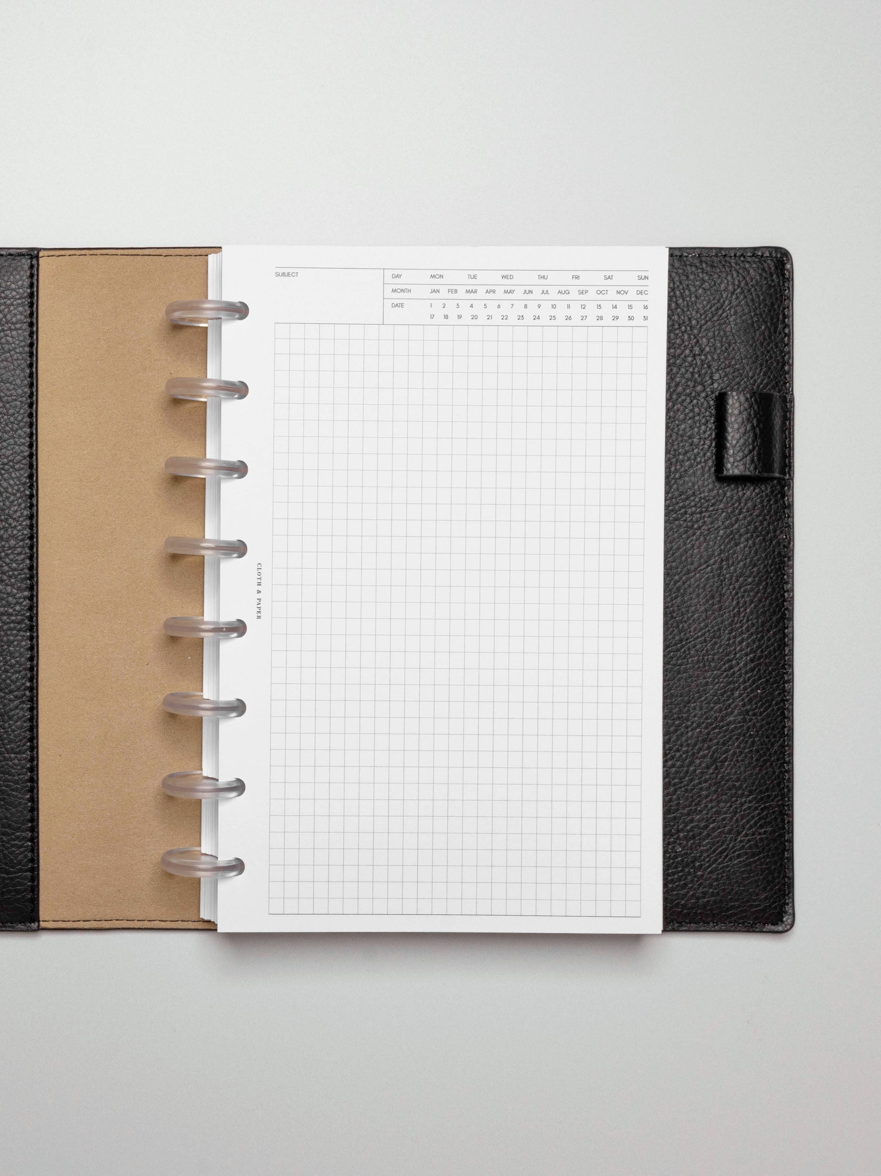 Insert in use inside a black leather planner.
