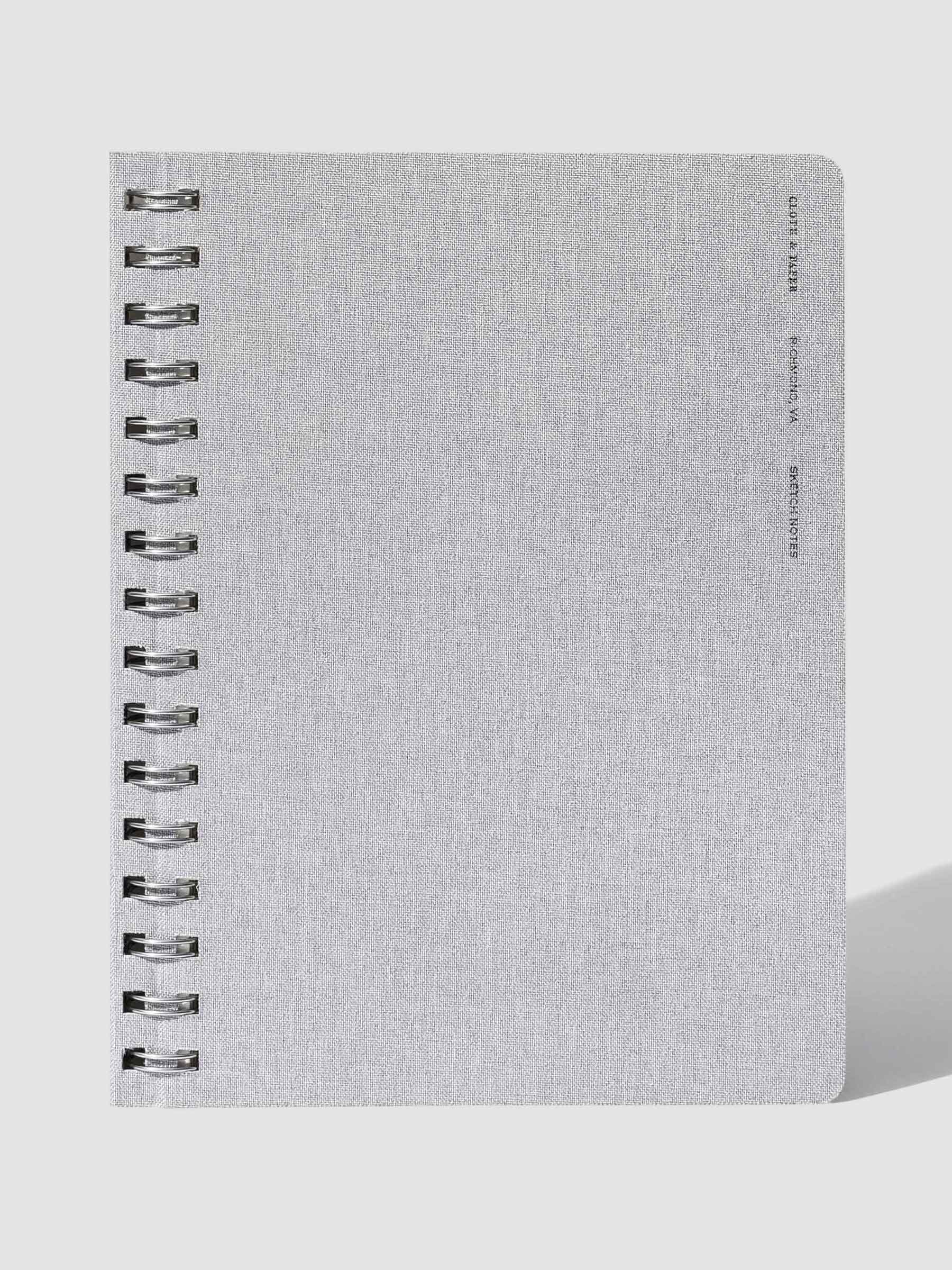Linen notebook displayed on a neutral background.