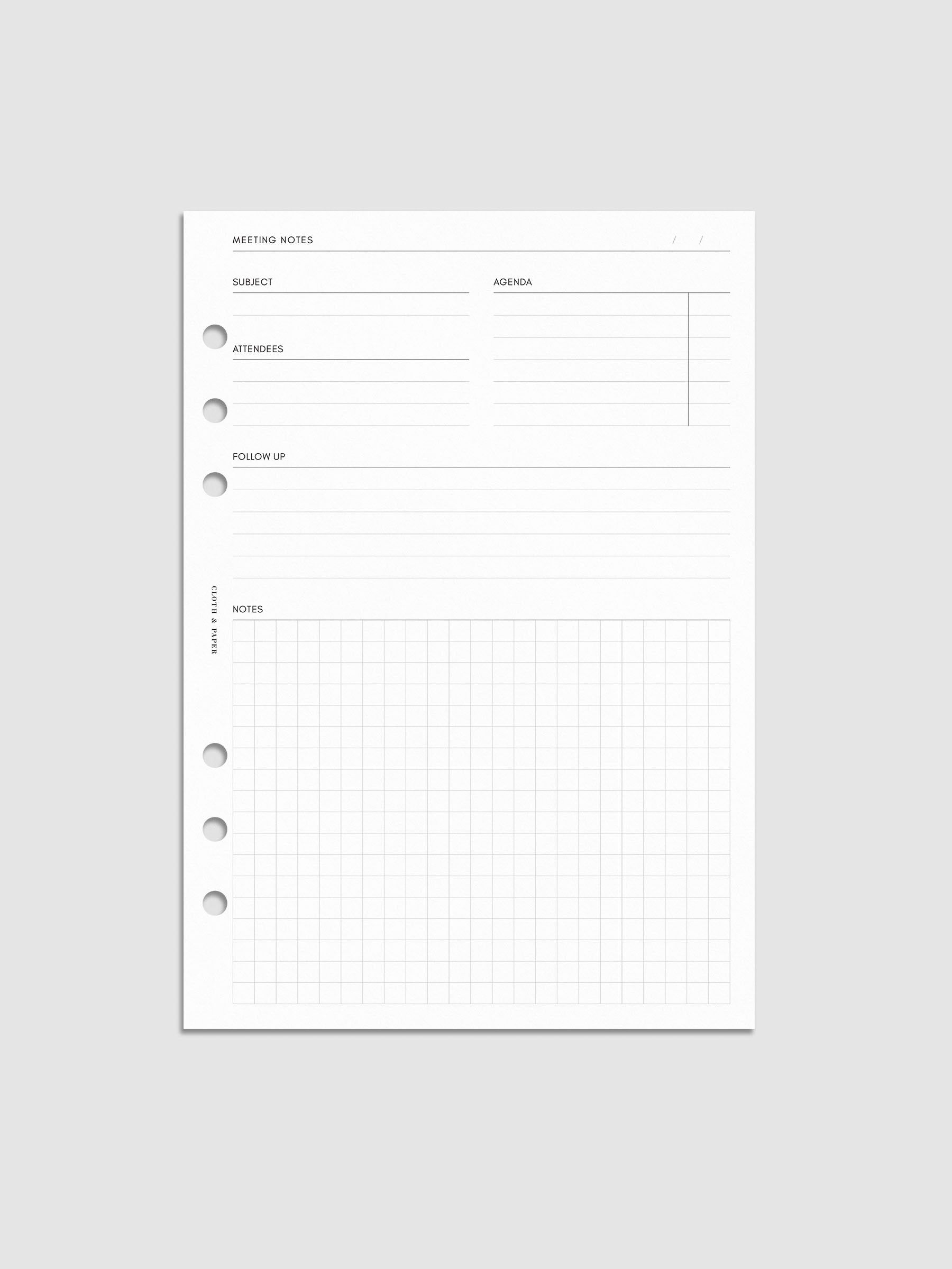 A minimal meeting notes insert with structured sections for subject, agenda, attendees, follow-up, and a gridded notes area. Clean white design with subtle grey lines and three binder punches on the left.