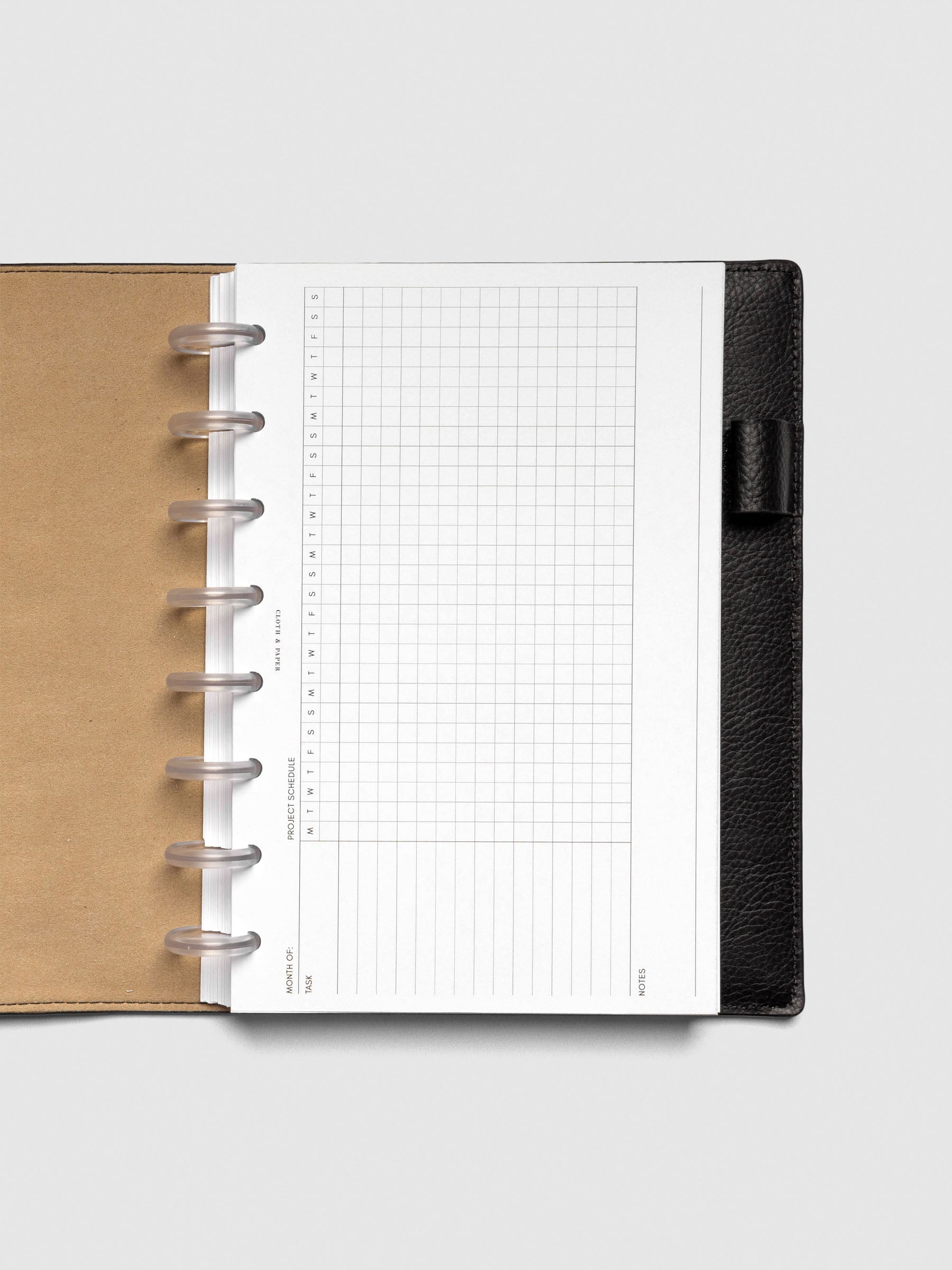 Insert in use inside a discbound planner system. Size shown is HalfLetter.