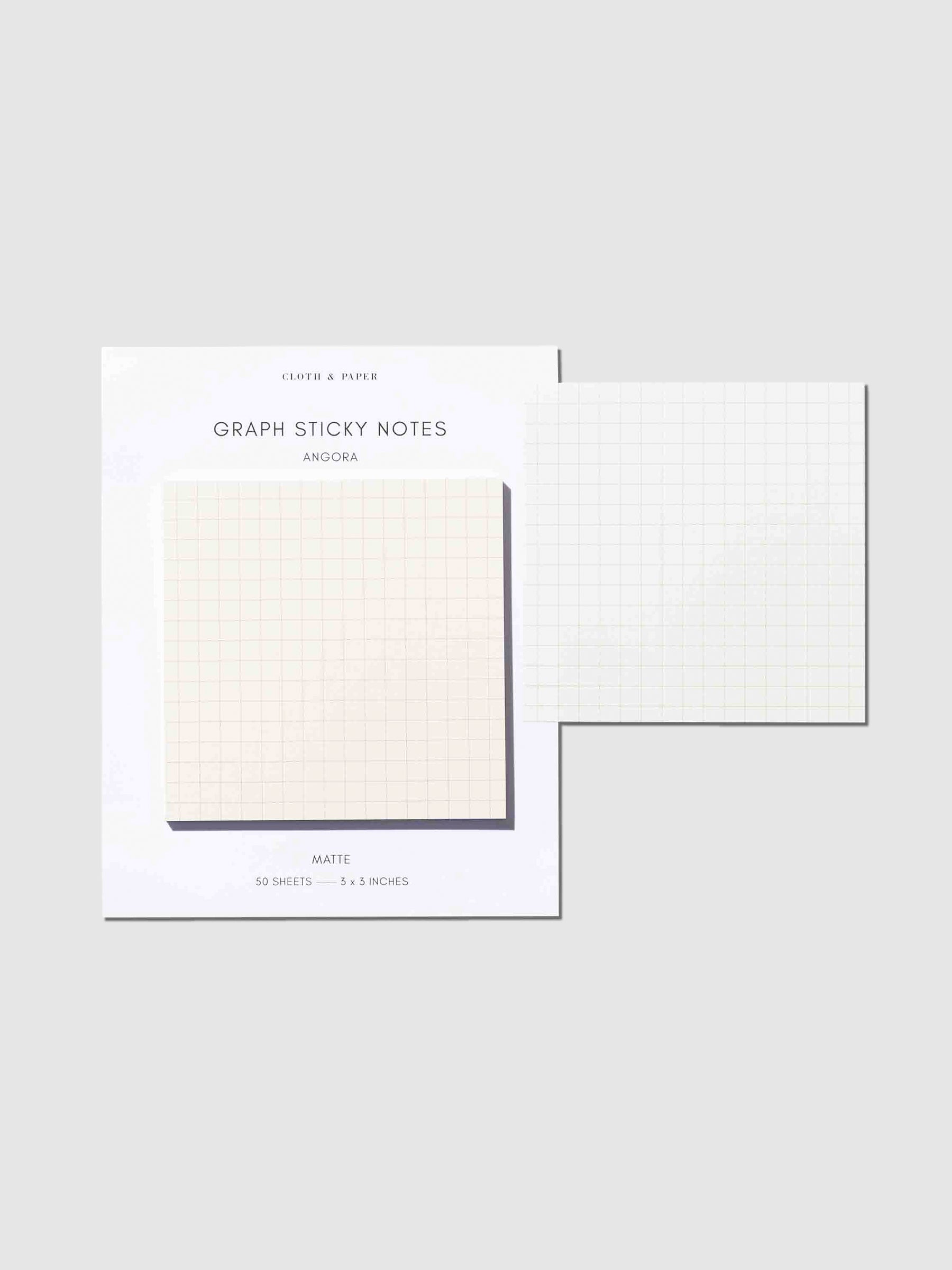 Sticky note shown on its backing, with one removed and stuck to the right side of the packaging.