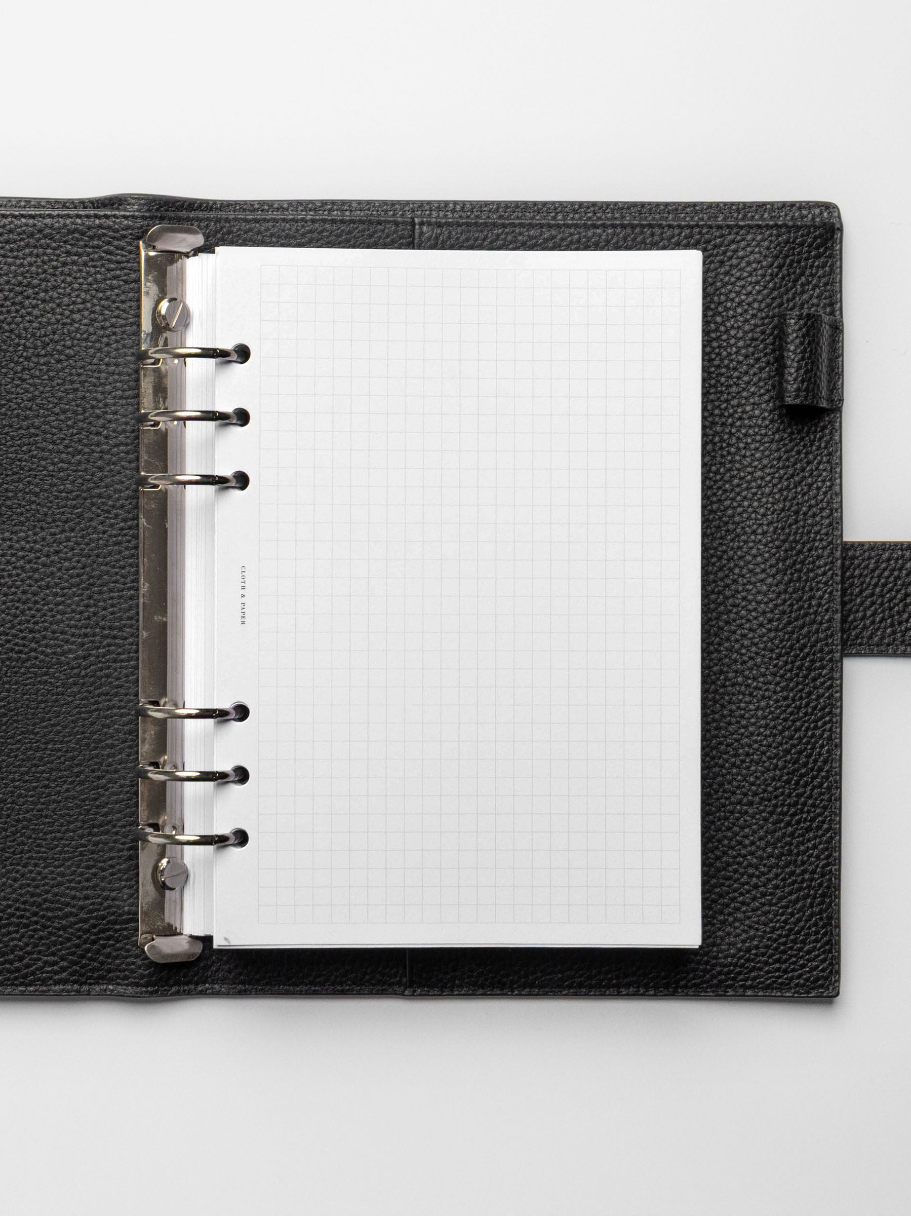 Insert in use inside a black leather planner.
