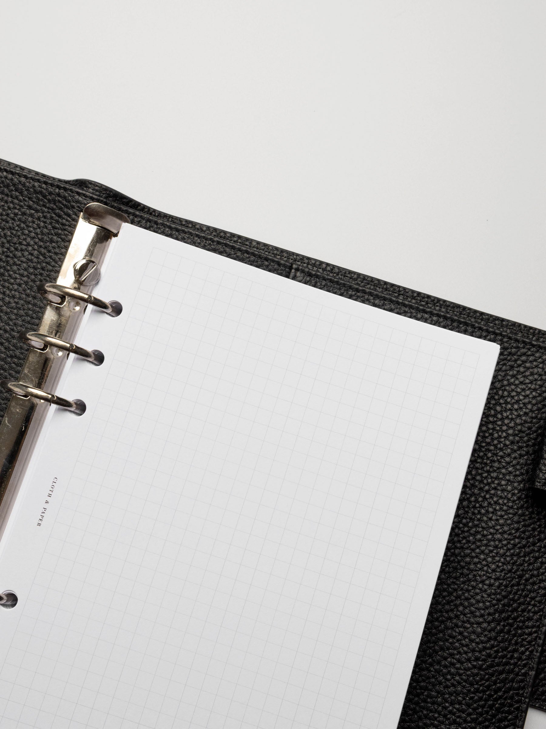 Insert in use inside a black leather planner.