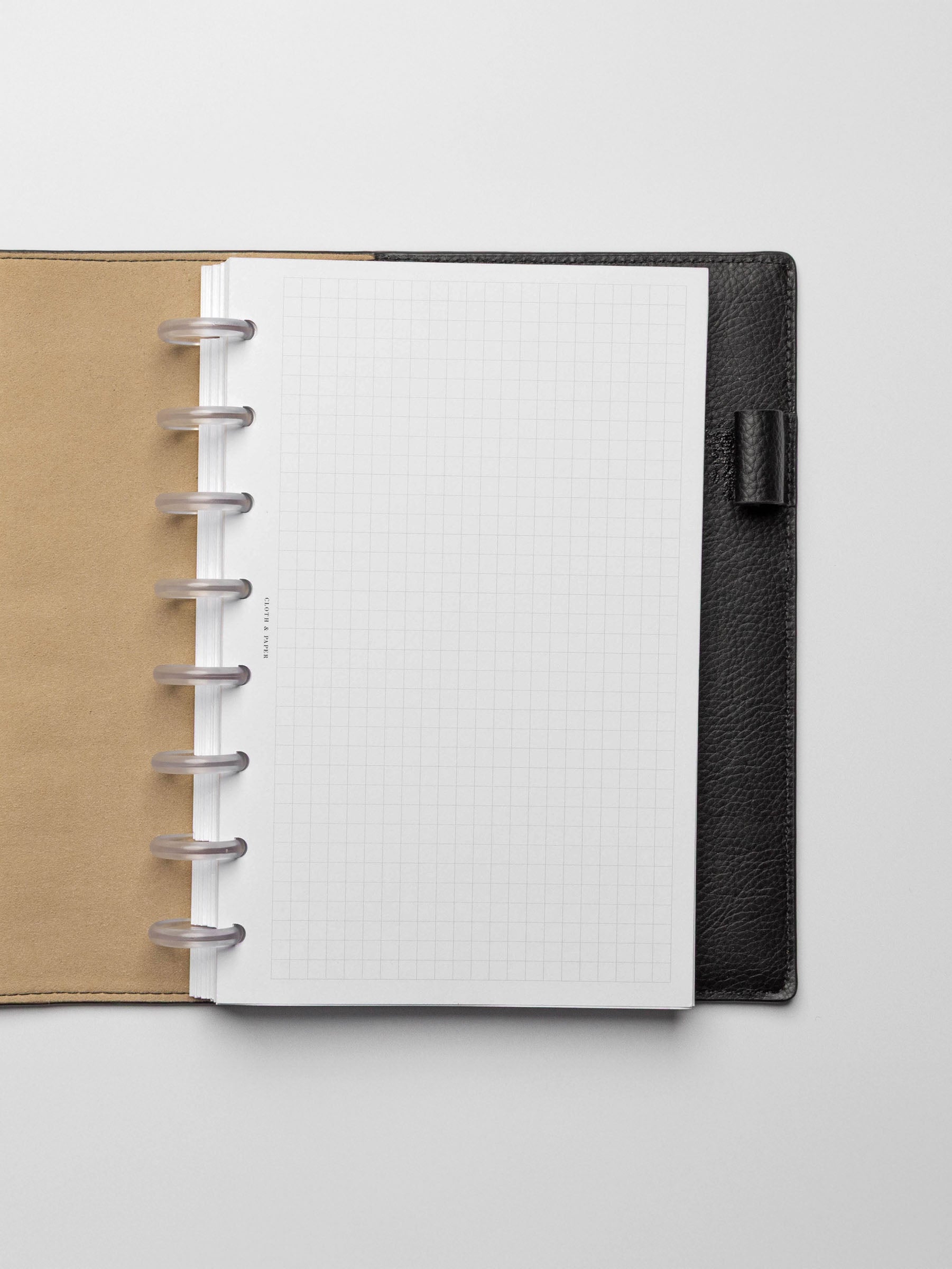 Insert in use inside a black leather planner.