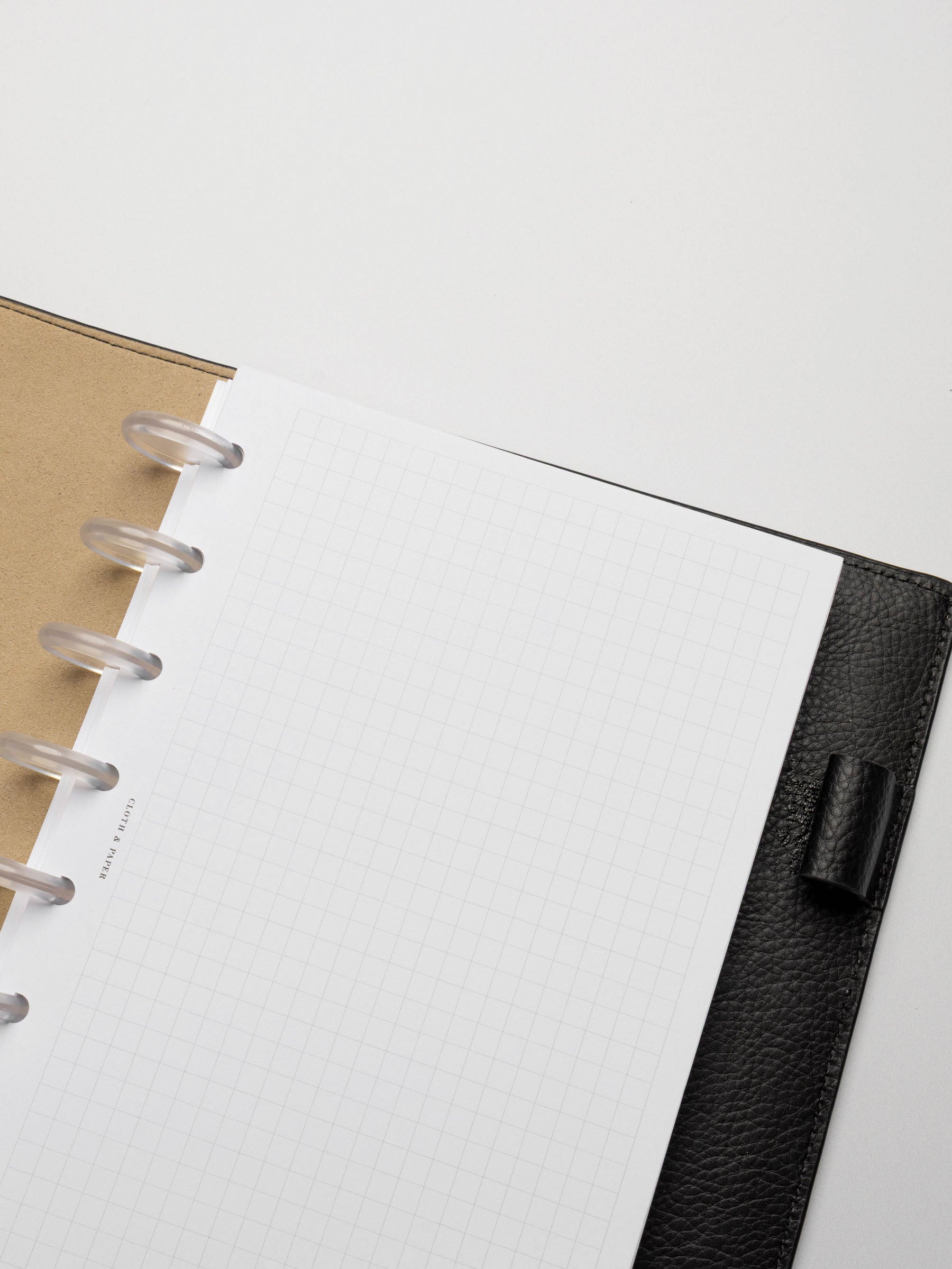 Insert in use inside a black leather planner.