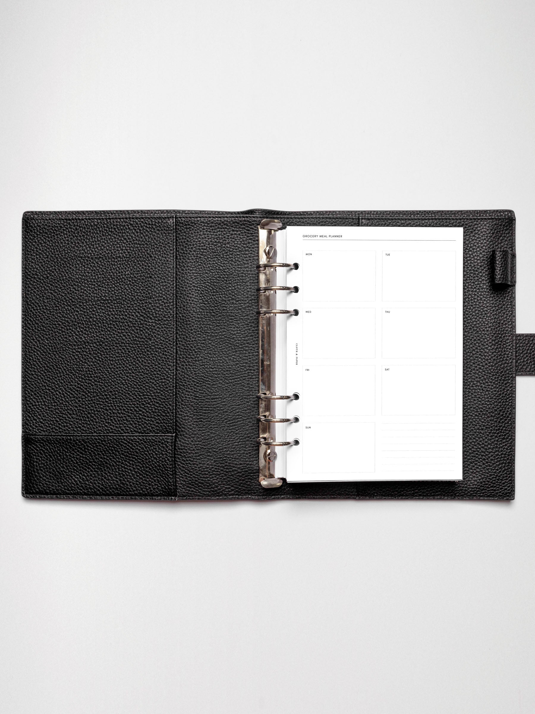 Grocery Meal Planner Insert inside an opened planner.