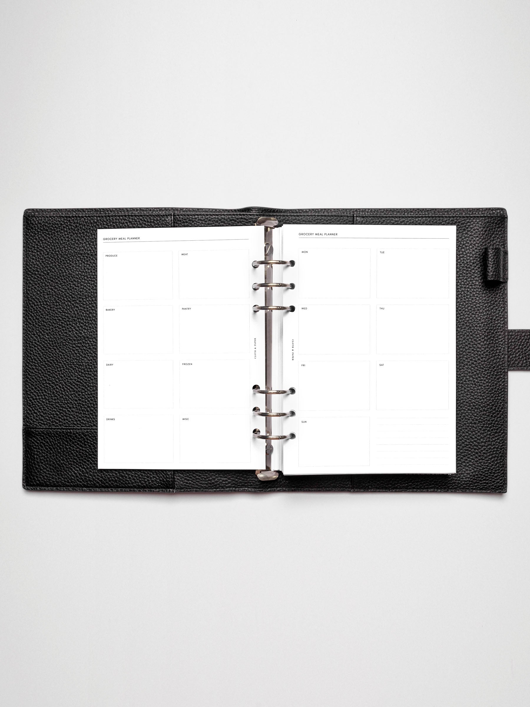 Grocery Meal Planner Insert inside an opened planner.