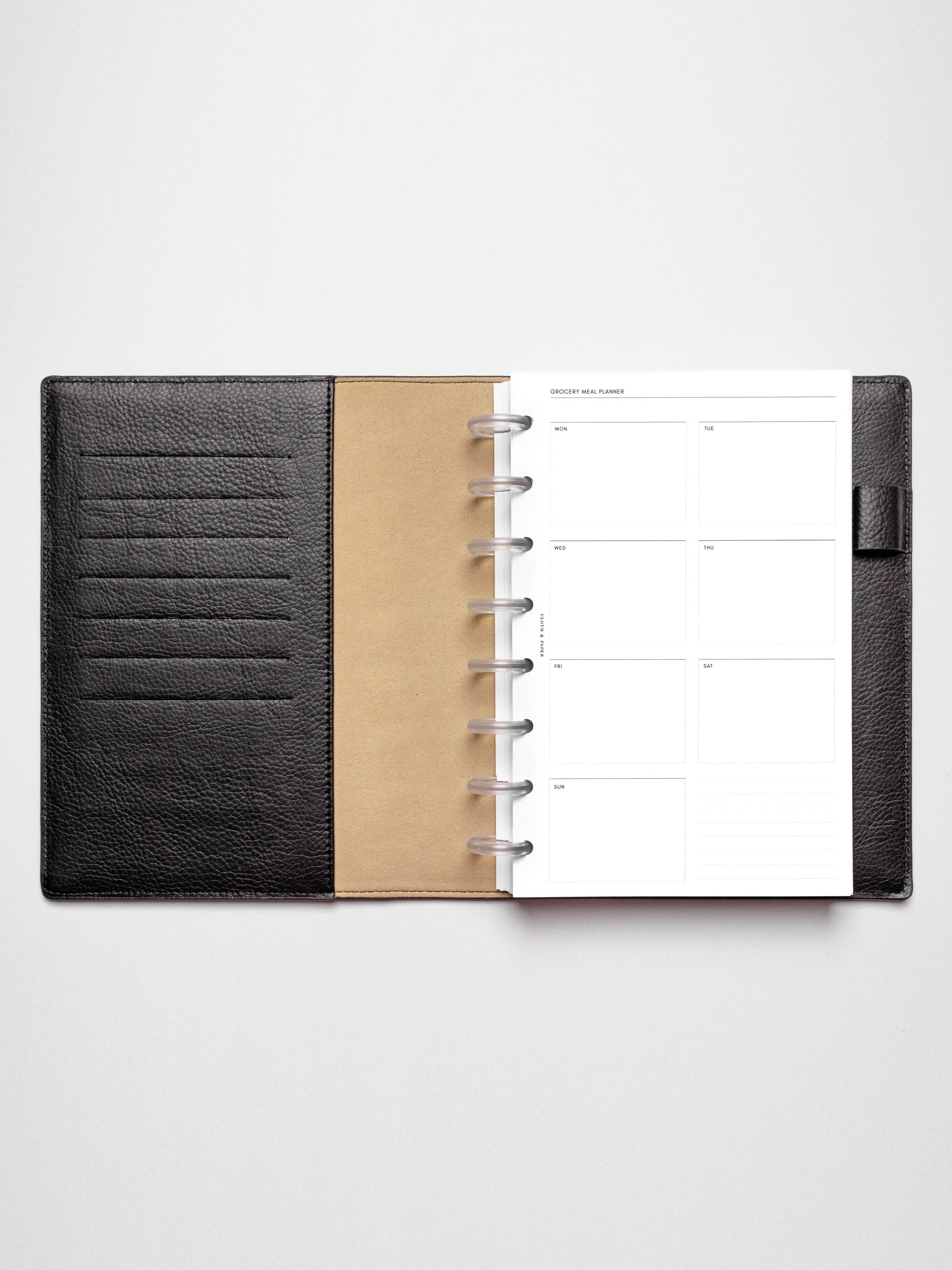 Grocery Meal Planner Insert inside an opened planner.