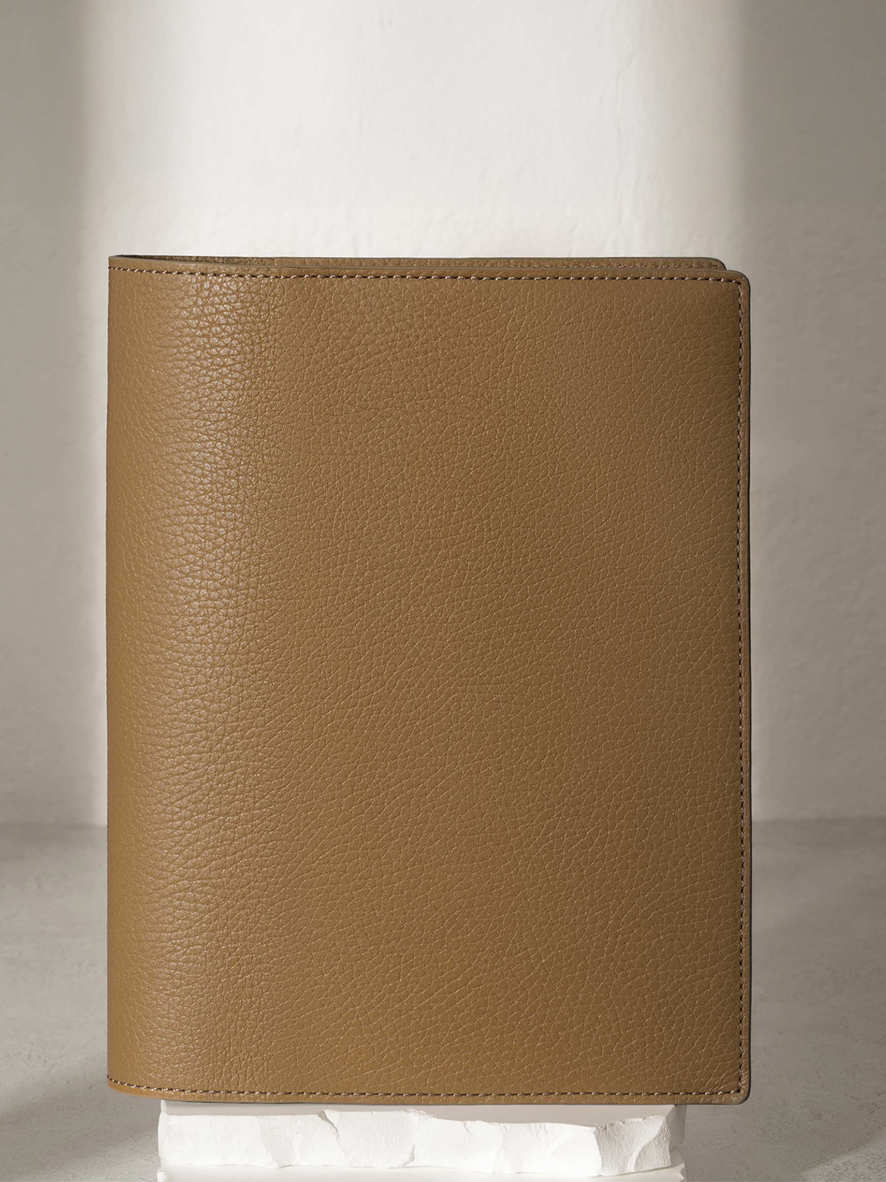 Catalonia folio displayed on a white pedestal.