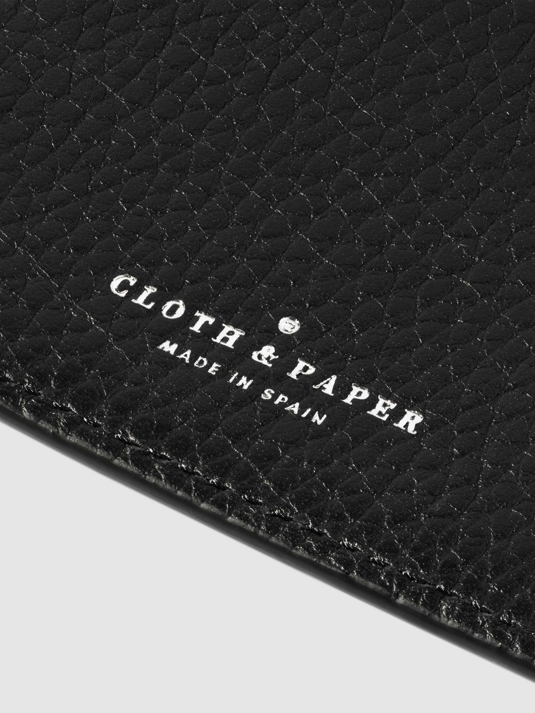 Closeup of Padrillo folio's foil-stamped Cloth and Paper Made in Spain logo.