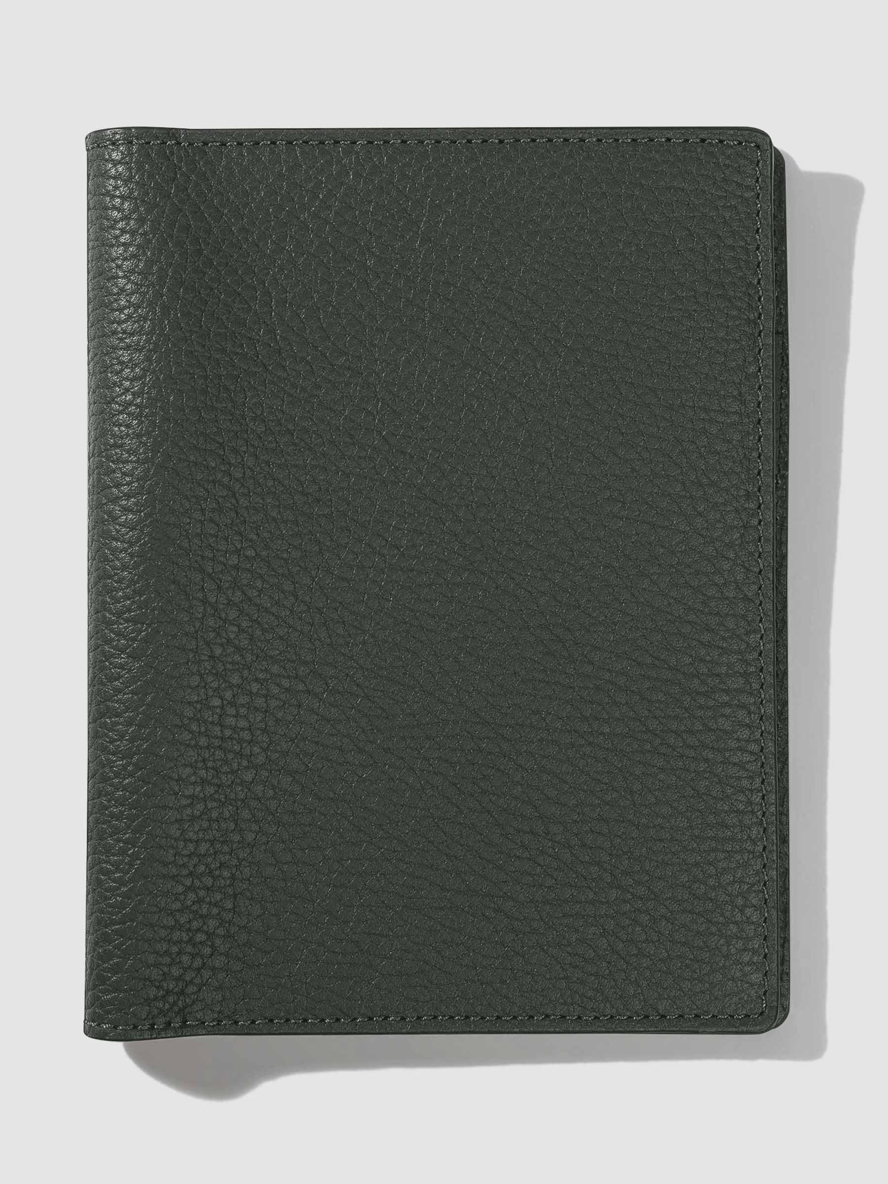 Small folio displayed on a neutral background.