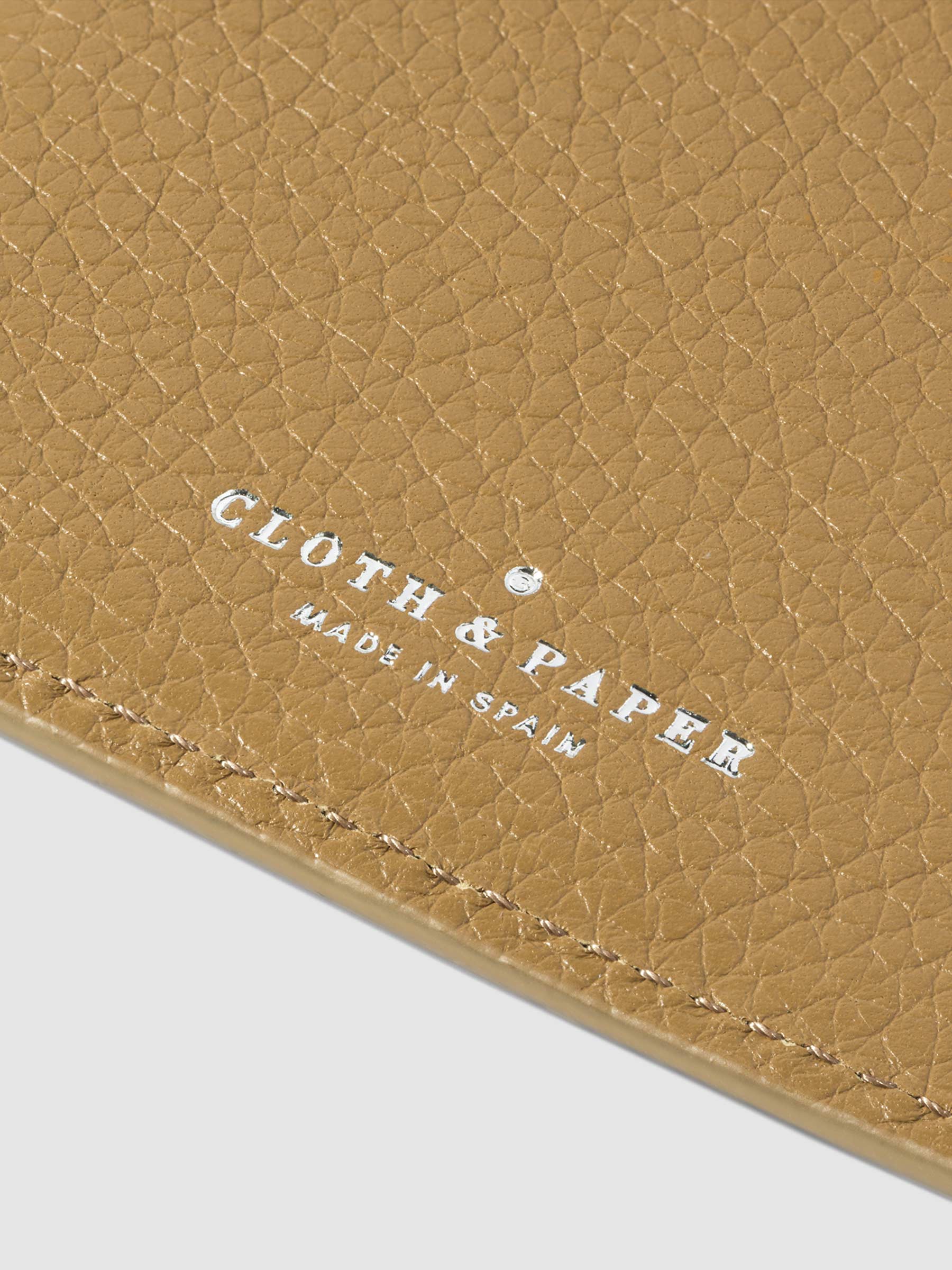 Closeup of Catalonia folio's foil-stamped Cloth and Paper Made in Spain logo.