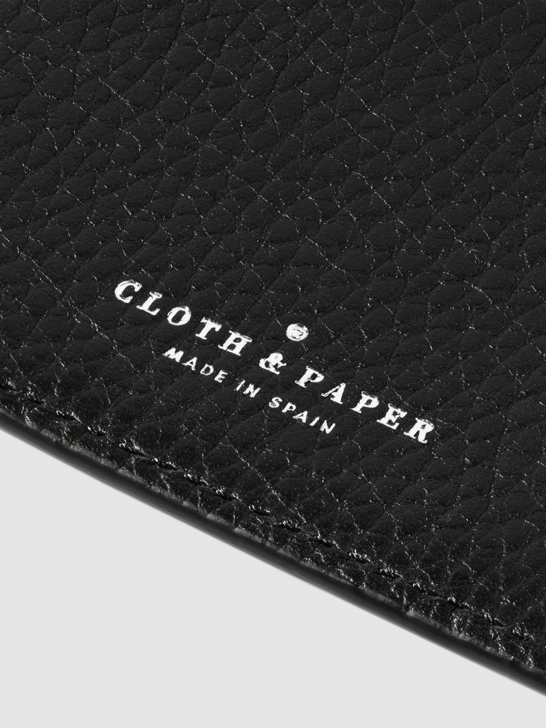 Closeup of Padrillo folio's foil-stamped Cloth and Paper Made in Spain logo.