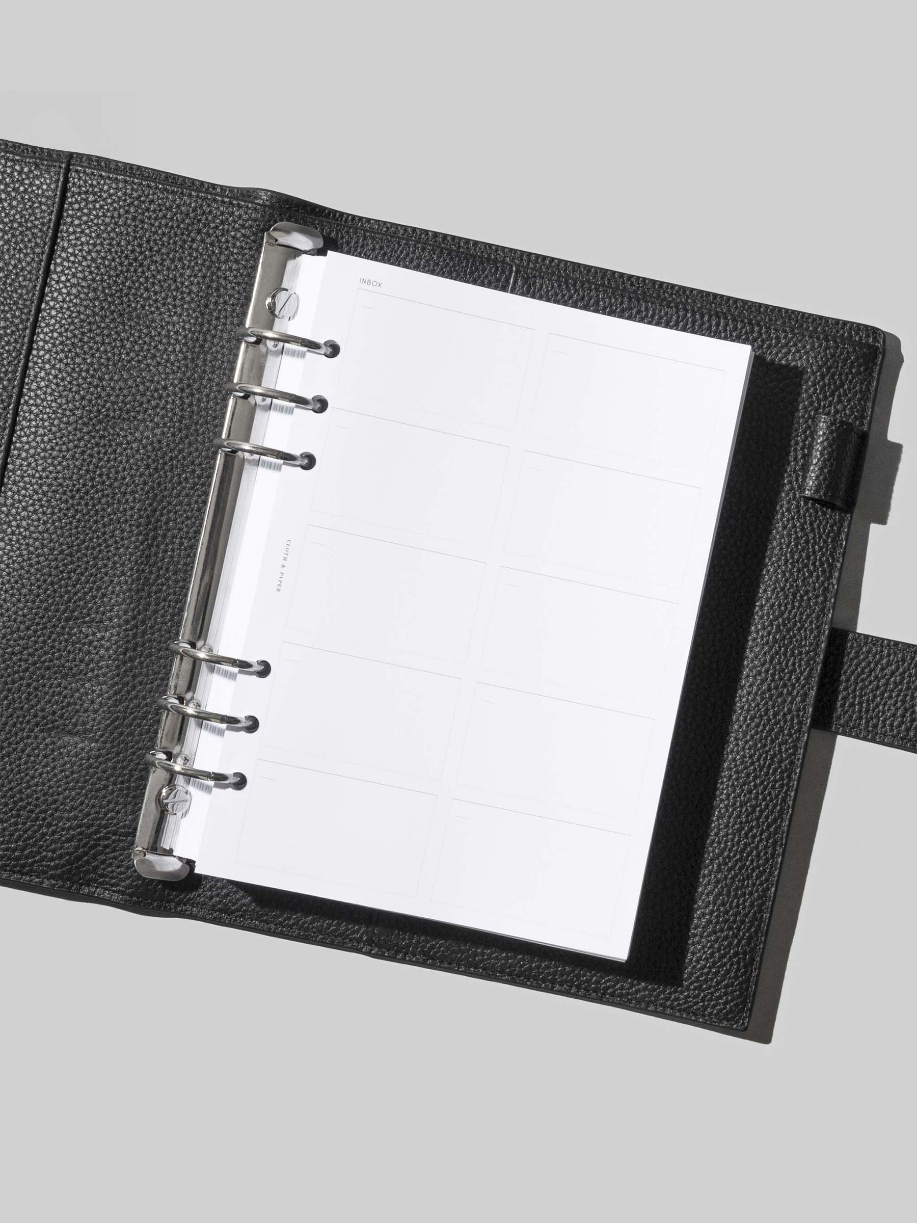 Insert in use inside an A5 leather agenda.