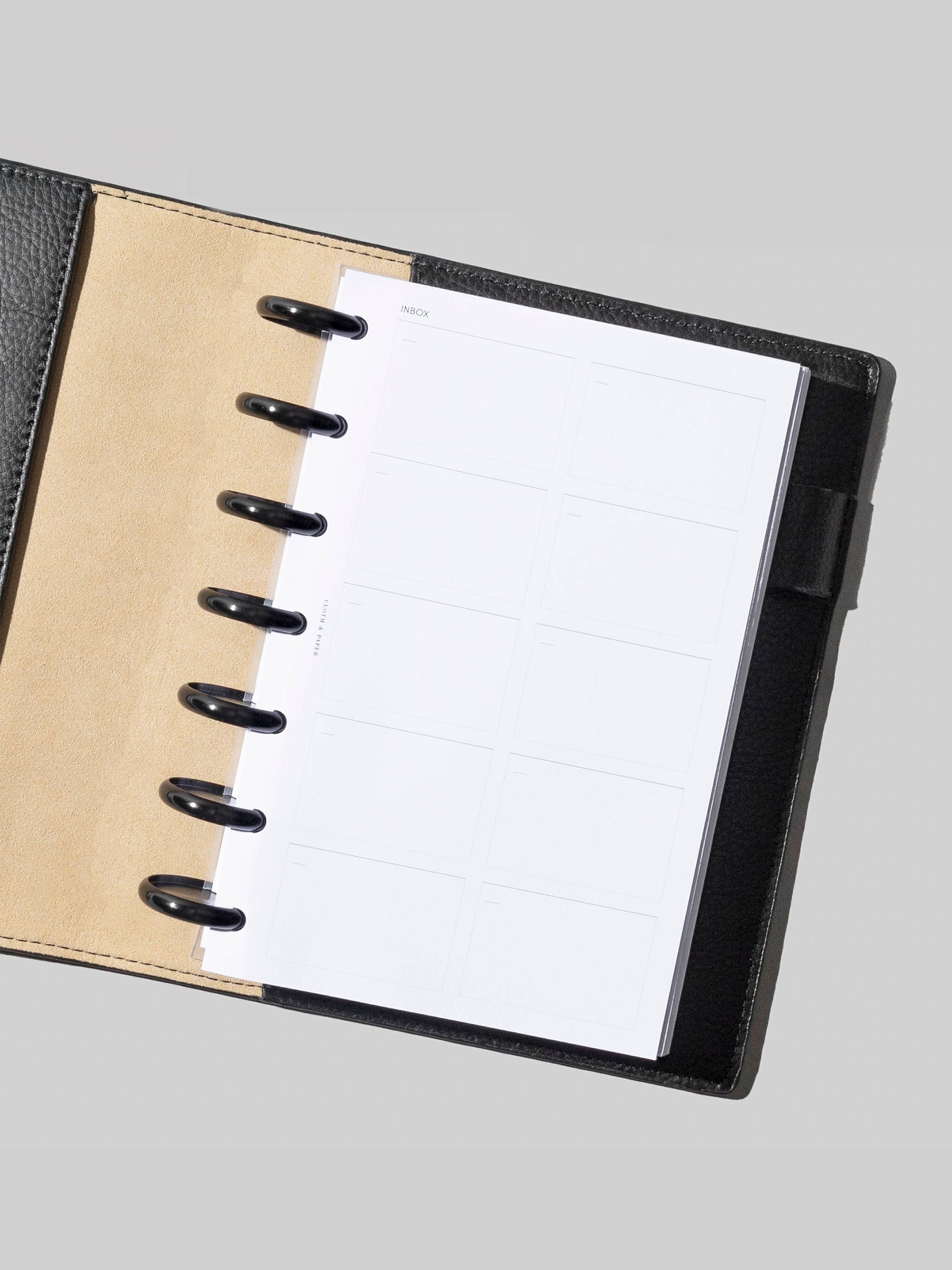 Insert in use inside a Small black leather folio.