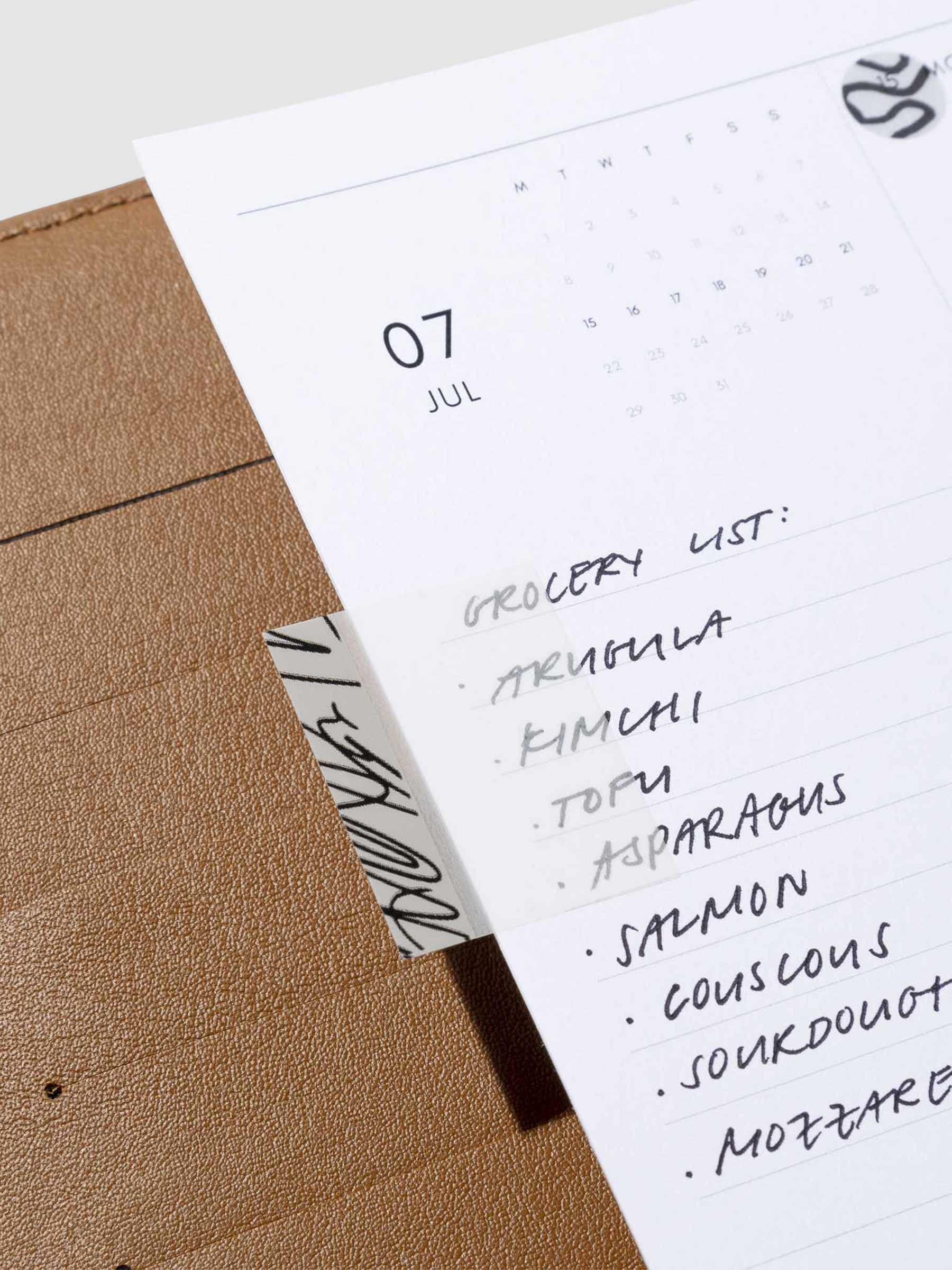 Index Page Flag use inside a brown leather planner.