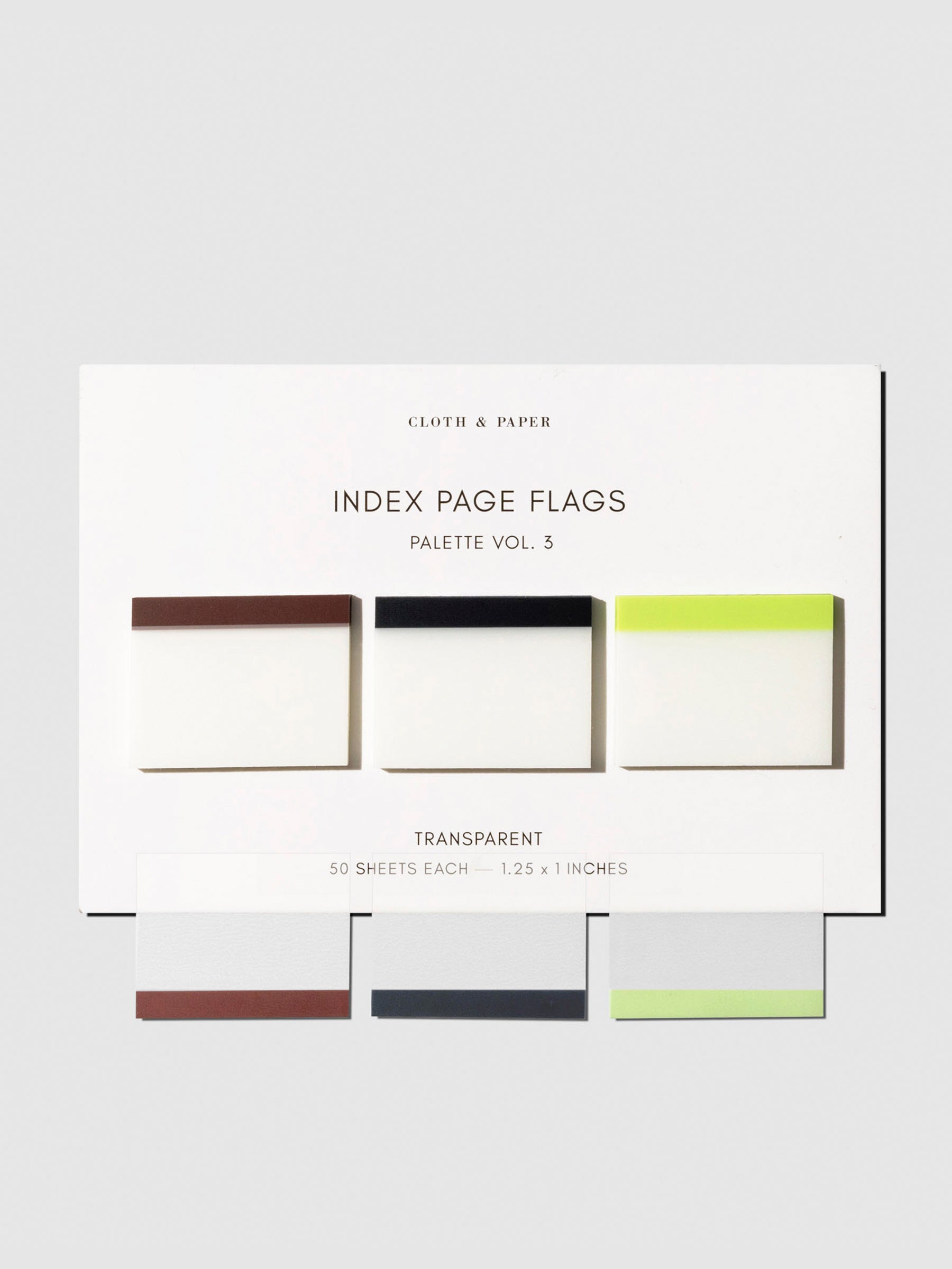 Set of 3 pages flags displayed on their backing on a neutral background. One page flag in each color is placed on the edge of the backing to show the page flag's transparency.