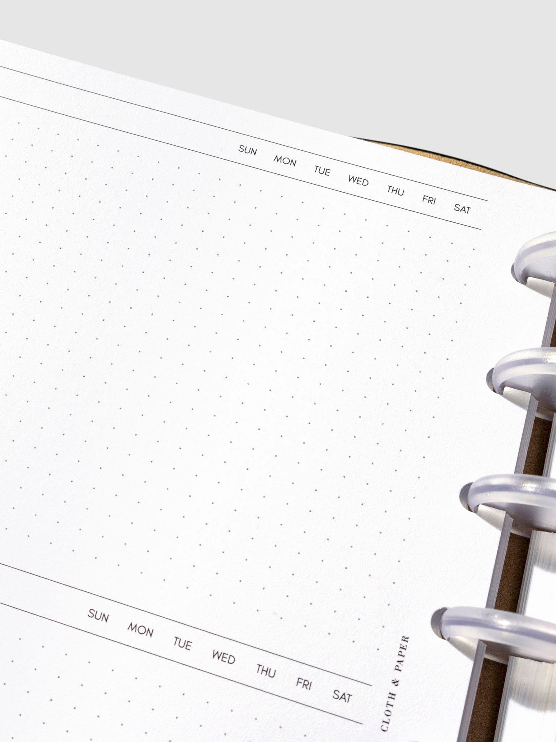 Closeup of inserts in use inside a leather folio.