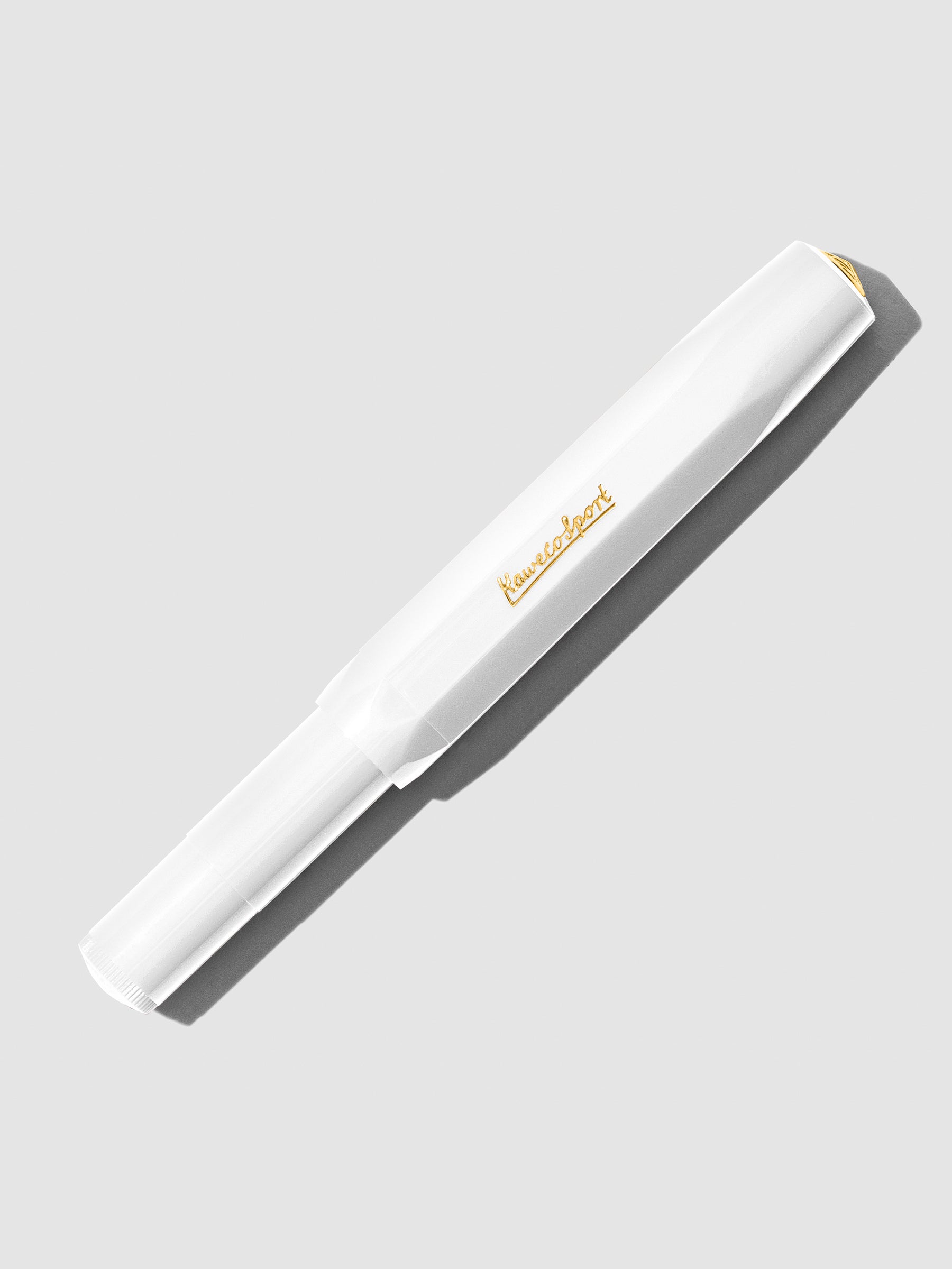 White Extra Fine Nib pen displayed capped on a neutral background.