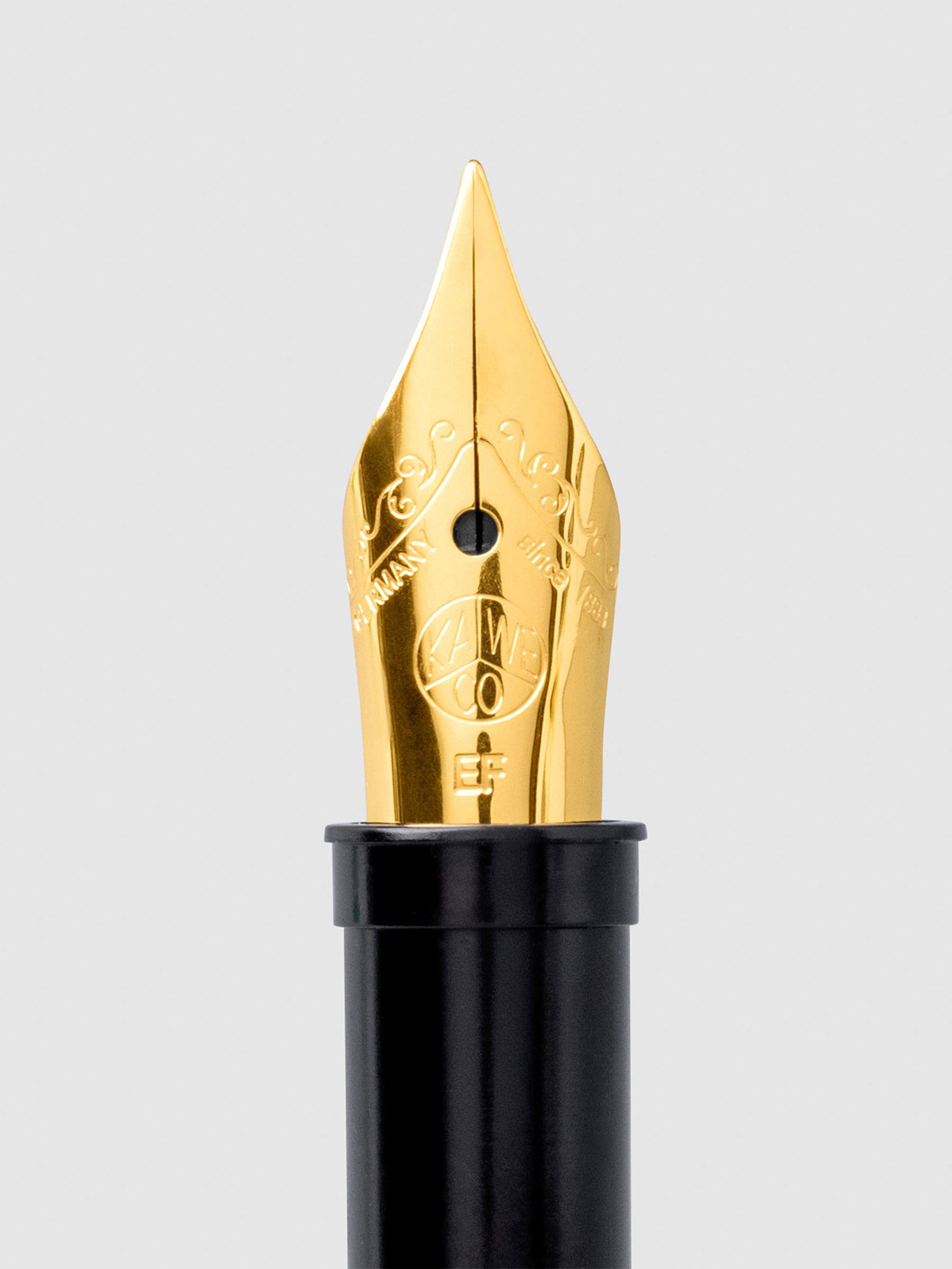 Kaweco Nib, Gold Plated Steel, Cloth and Paper. Extra fine nib displayed on a neutral background.