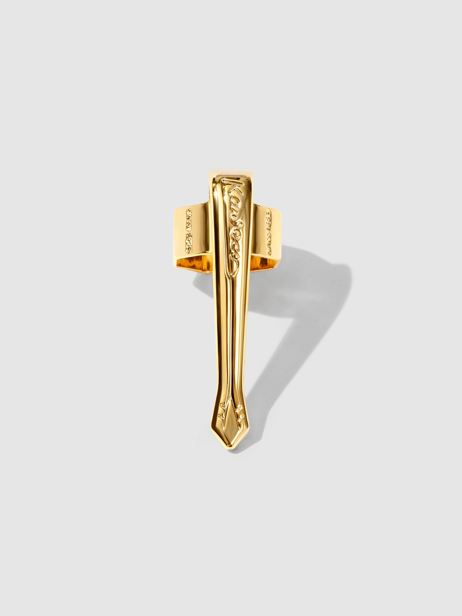 Nostalgic gold clip displayed on a neutral background.