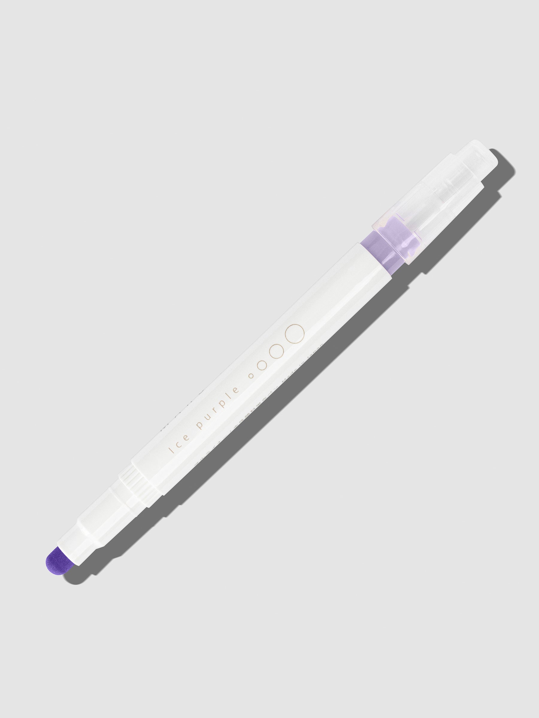Ice Purple highlighter with tip exposed and cap posted to the end of its barrel on a neutral background.