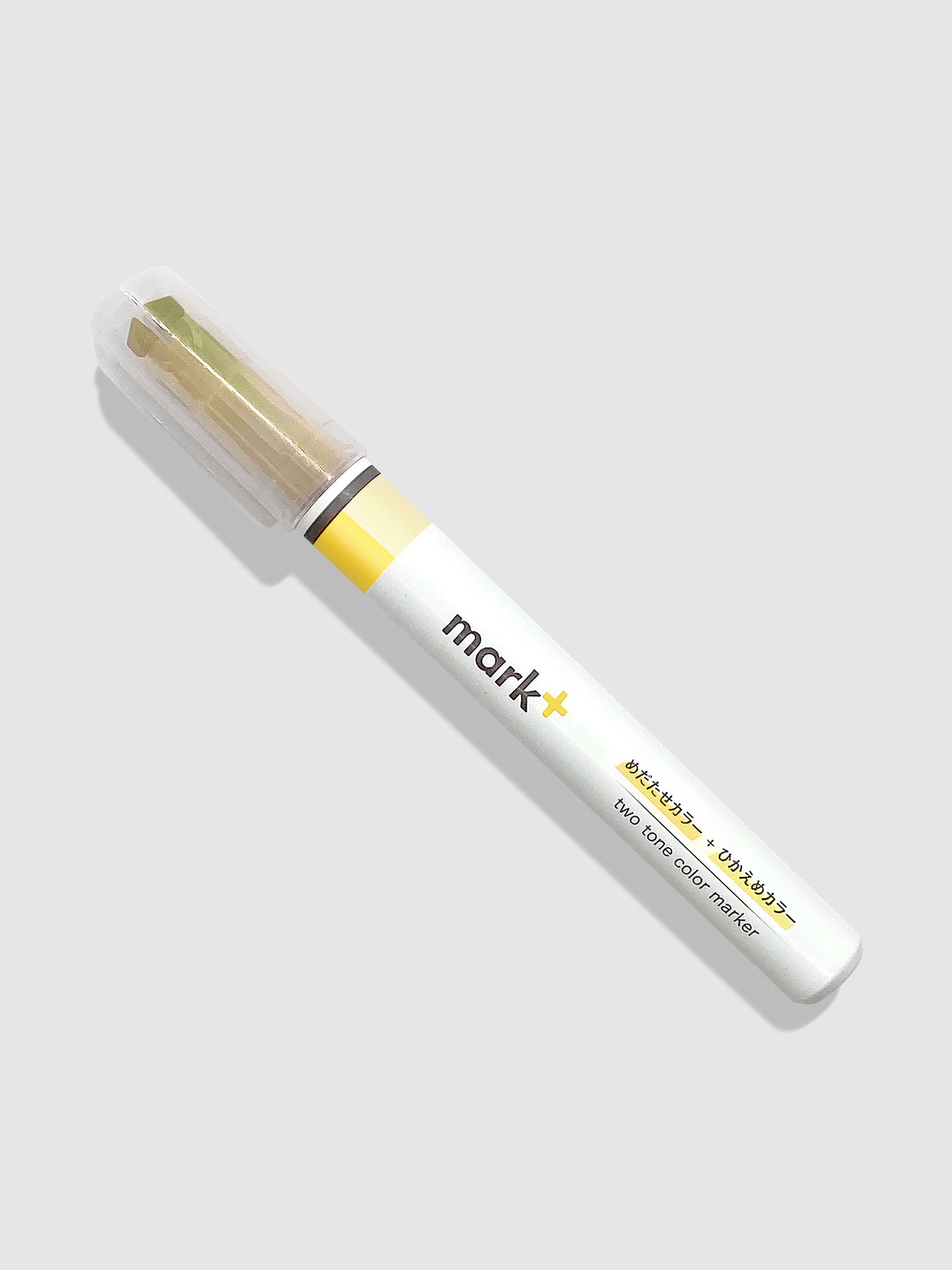 Kokuyo Mark Plus Two Tone Highlighter in Yellow turned to the left against a neutral background.