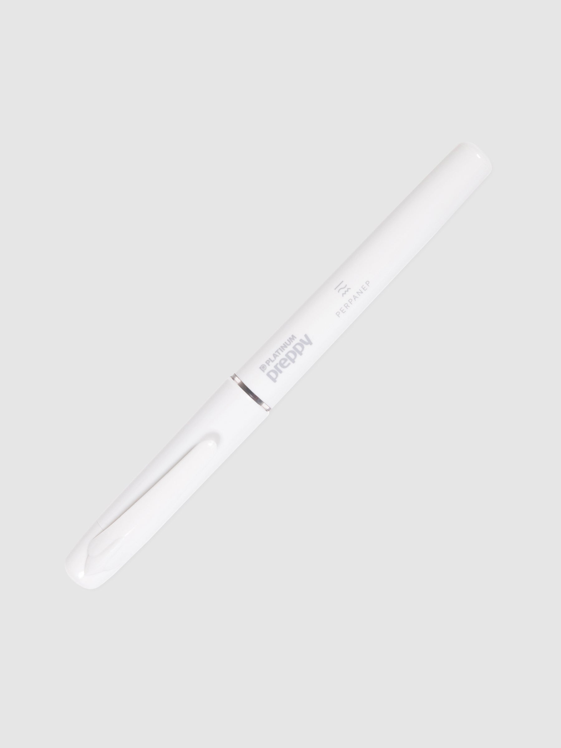 Kokuyo x Platinum Preppy Perpanep Fountain Pen, Cloth and Paper. Pen turned to the right against a neutral background.