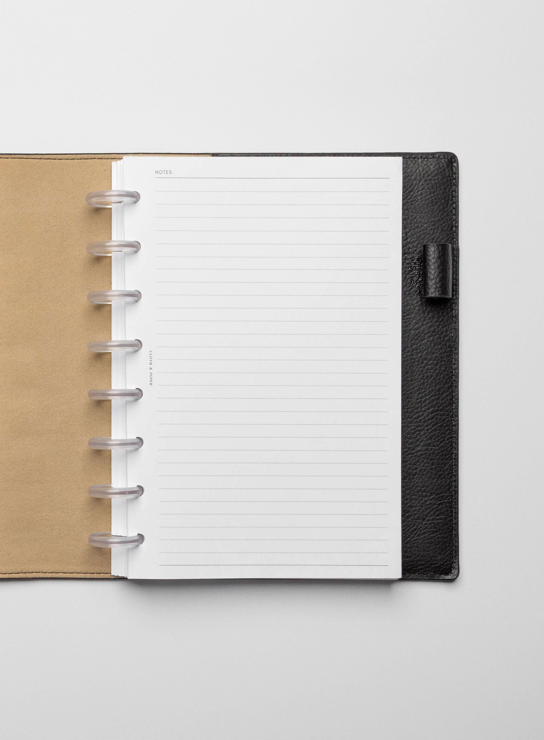 Insert in use inside a black leather planner.