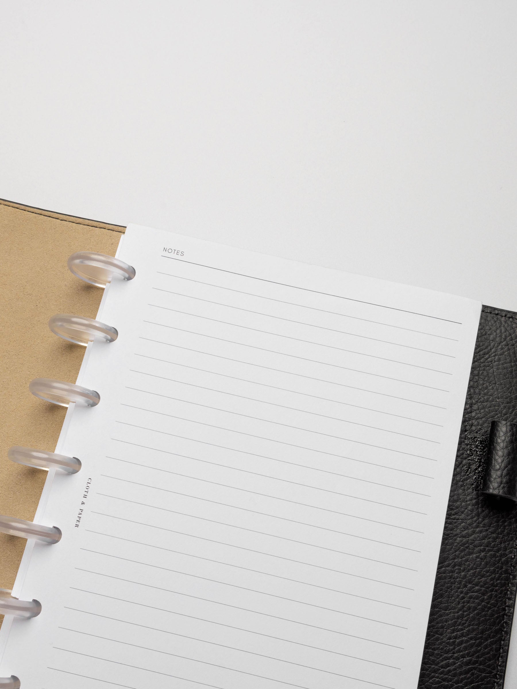 Insert in use inside a black leather planner.