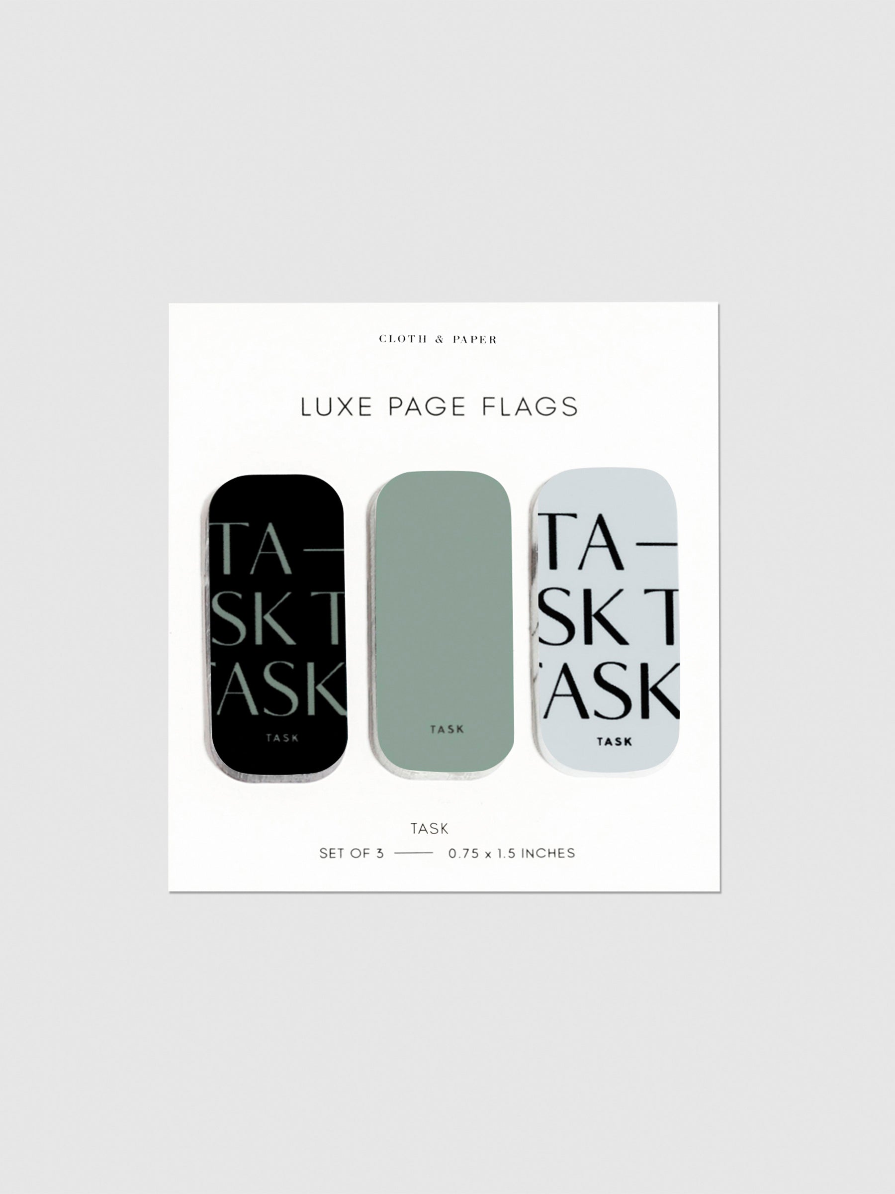 Luxe page flags on their backing on a neutral background. The text on the left and right flag read "Task" repeated multiple times.