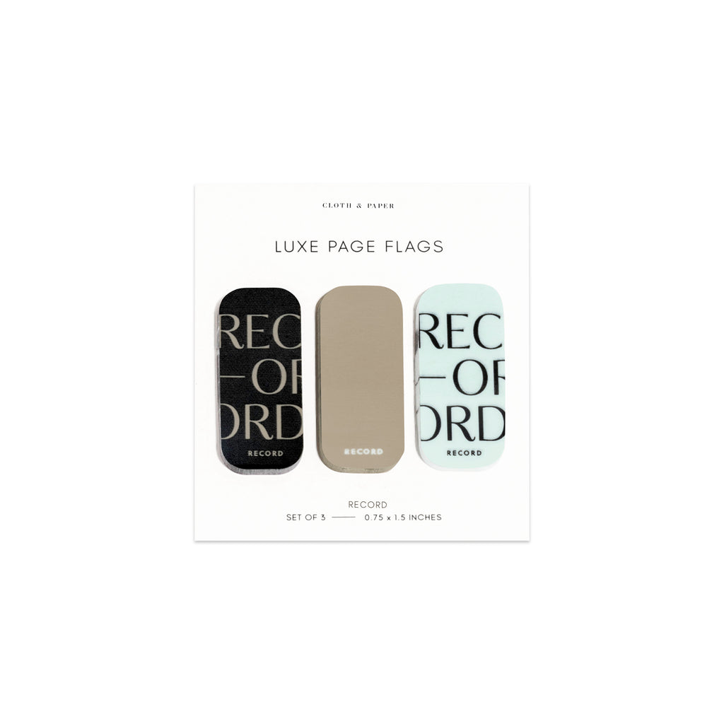 Luxe page flags on their backing on a white background. The text on the left and right flag read "Record" repeated multiple times.